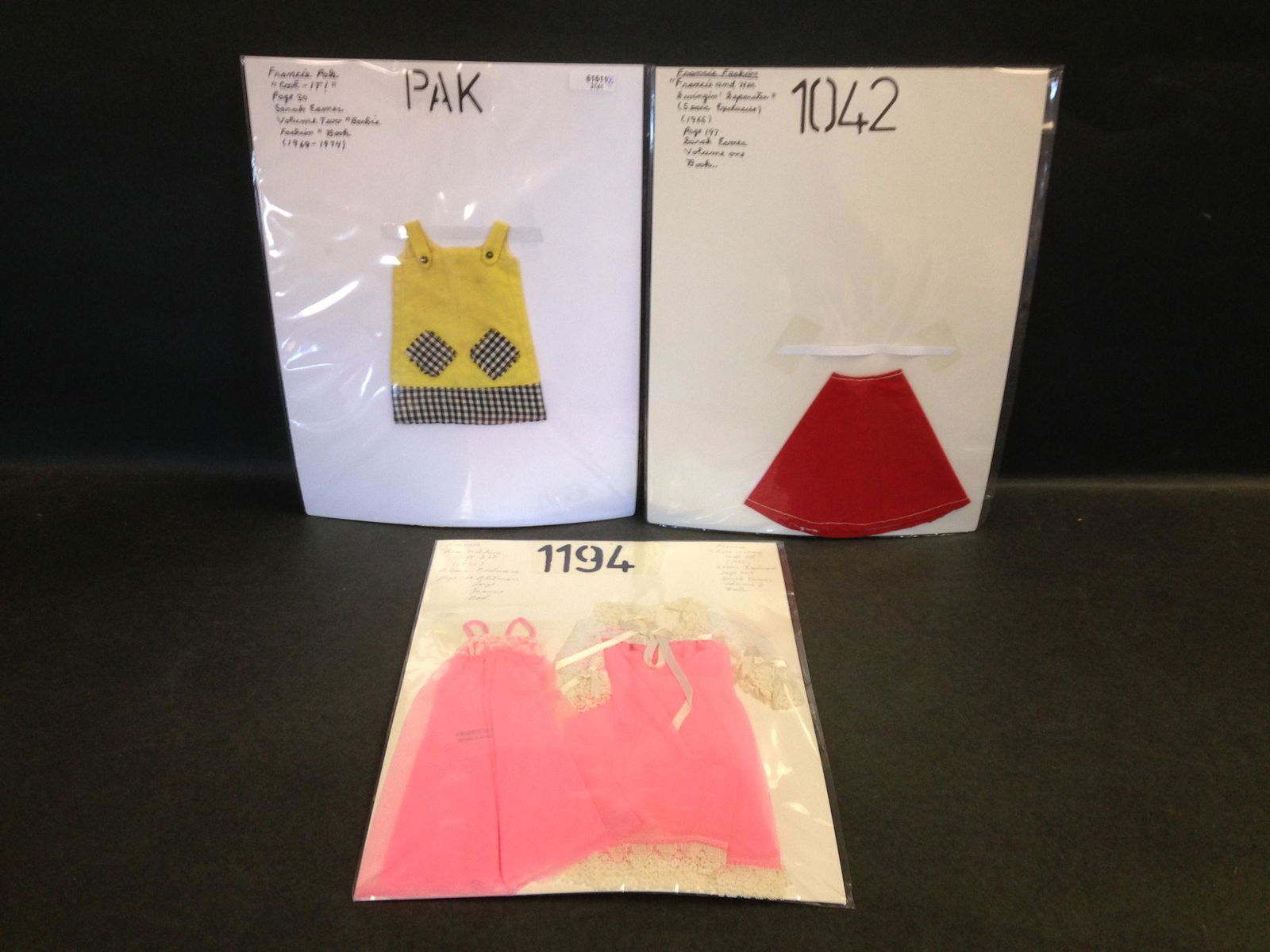 (5) FRANCIE FASHIONS INCLUDING SUMMER SHIFT FROM: (5) FRANCIE FASHIONS INCLUDING SUMMER SHIFT FROM "COOL-IT!" PAK, A-LINE SKIRT FROM SEARS EXCLUSIVE "FRANCIE AND HER SWINGIN' SEPARATES" #1042, PINK NYLON GOWN AND ROBE FROM SEARS EXCLUSIVE "RISE 'N SH