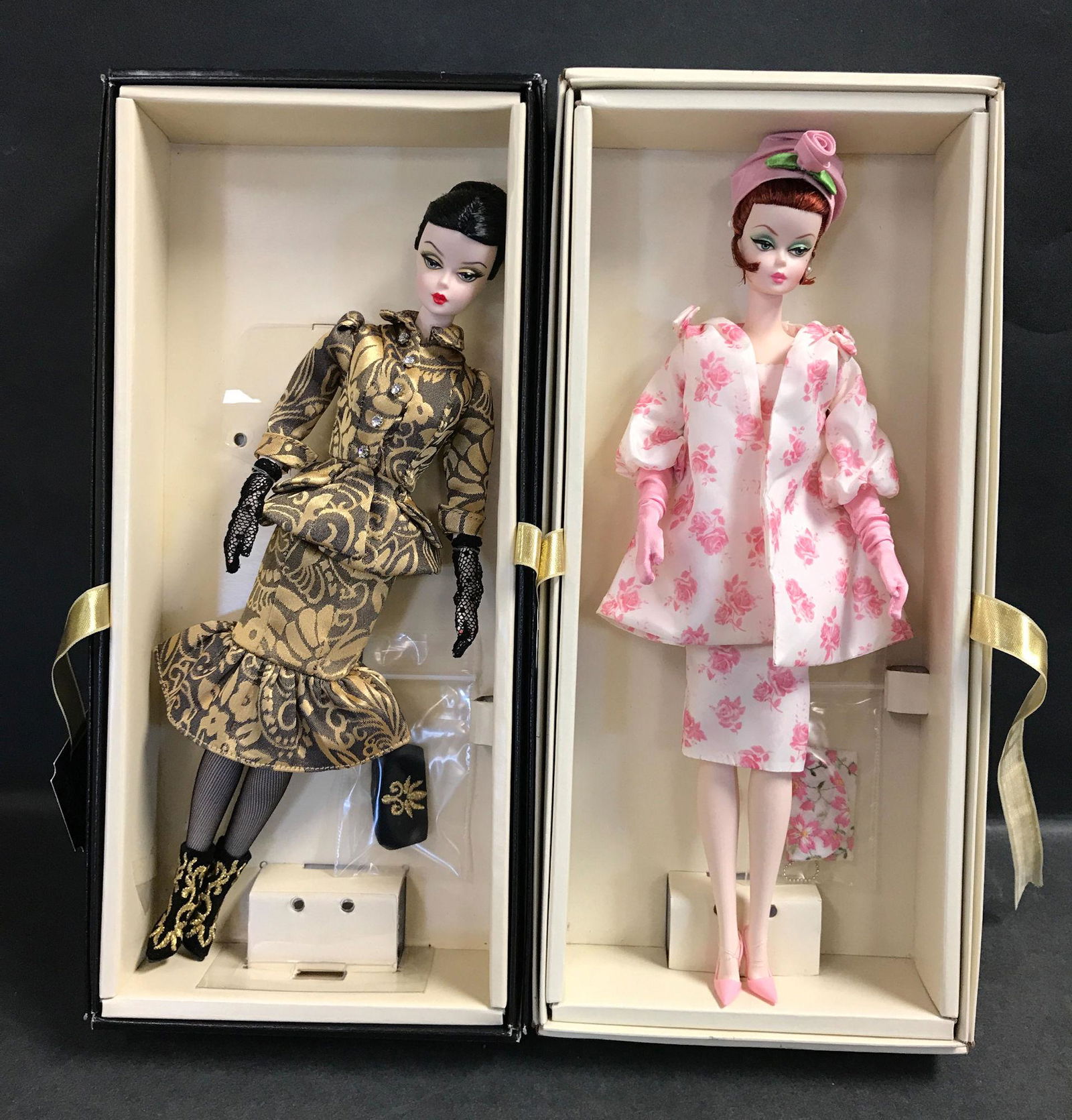 (2) SILKSTONE BARBIES INCLUDING "LUCIANA" AND "LUNCHEON: (2) SILKSTONE BARBIES INCLUDING "LUCIANA" AND "LUNCHEON ENSEMBLE". BOTH DOLLS HAVE BEEN REMOVED FROM THEIR BOXES AND DISPLAYED. BOXES ARE INCLUDED.