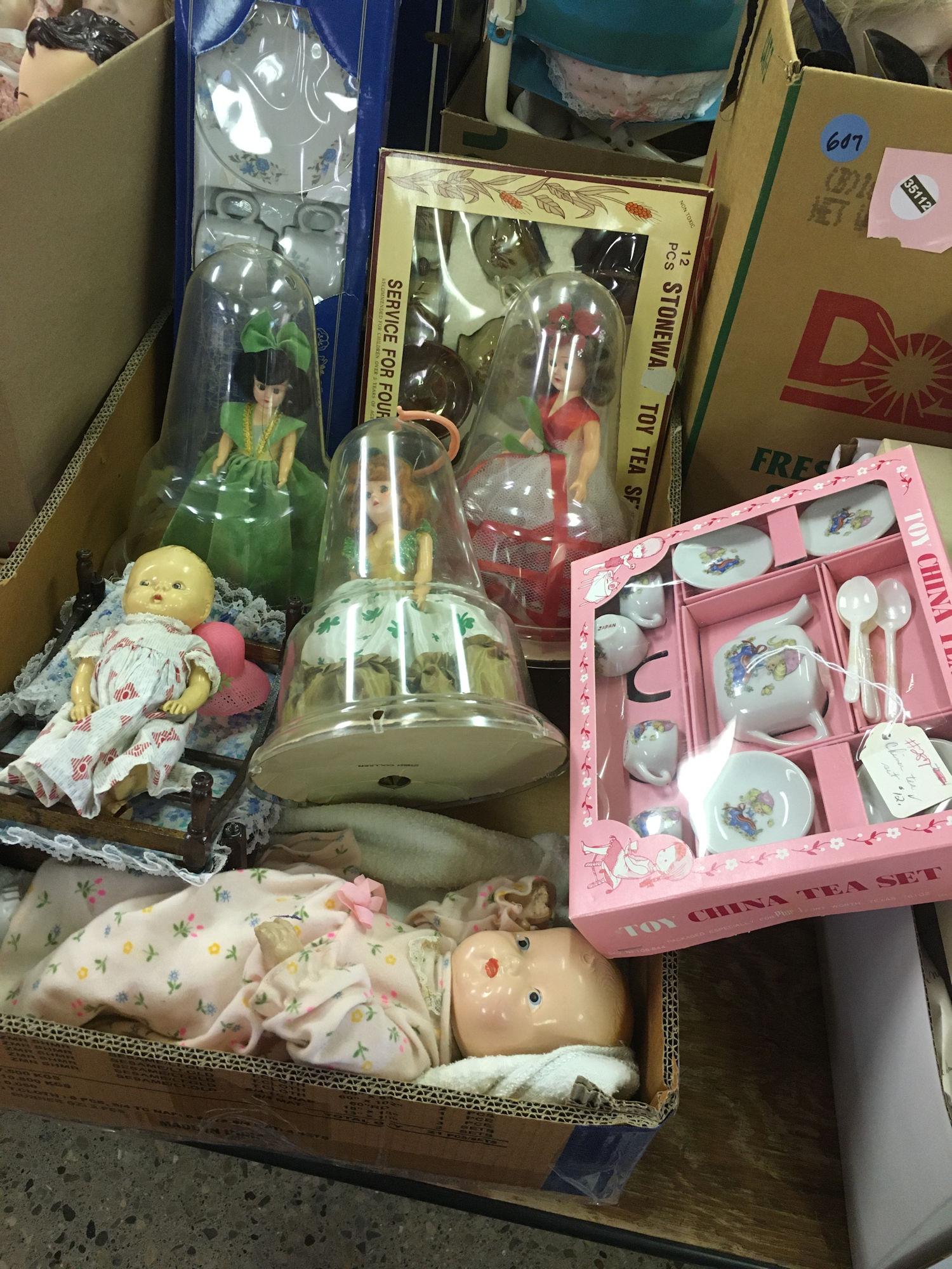 LOT OF DOLLS AND TEA SETS: LOT OF DOLLS AND TEA SETS