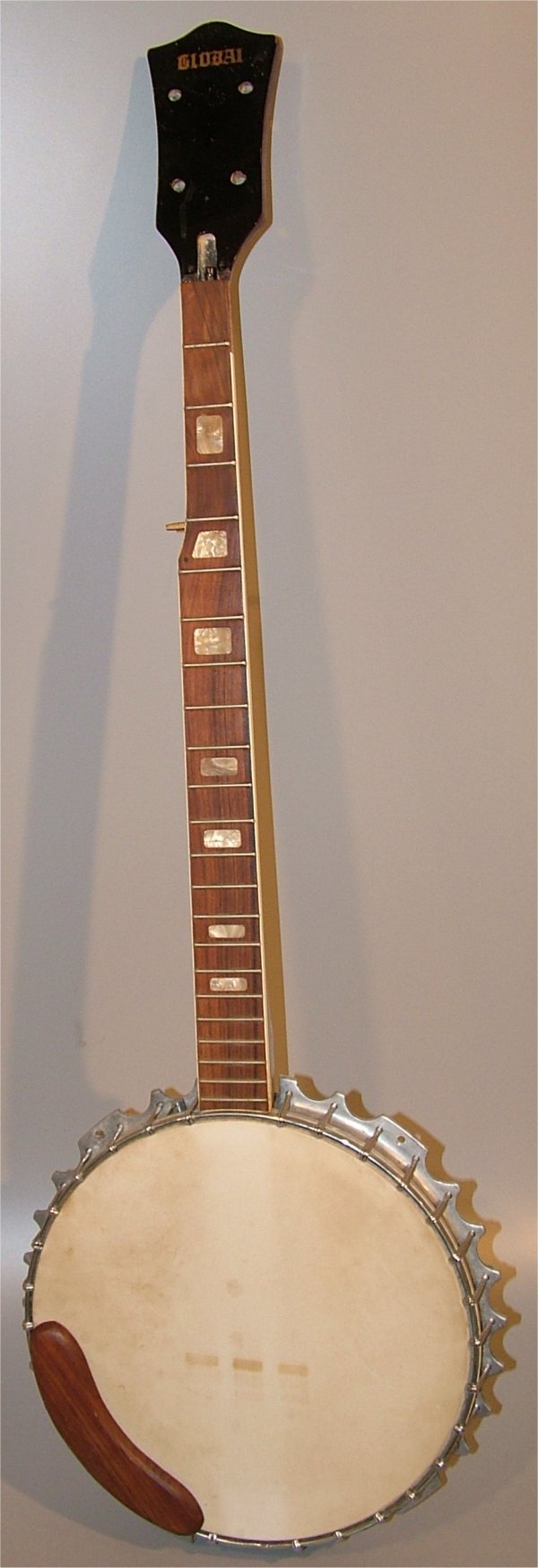 GLOBAL 4 STRING BANJO W/M.O.P, MISSING SOME INLAY: GLOBAL 4 STRING BANJO W/M.O.P, MISSING SOME INLAY & STRINGS 38 1/2"L