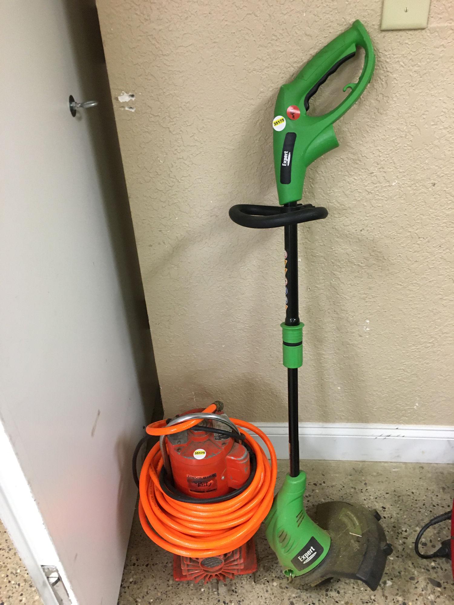 OLD AIR COMPRESSOR WITH CORDED WEEDEATER (1 of 1)