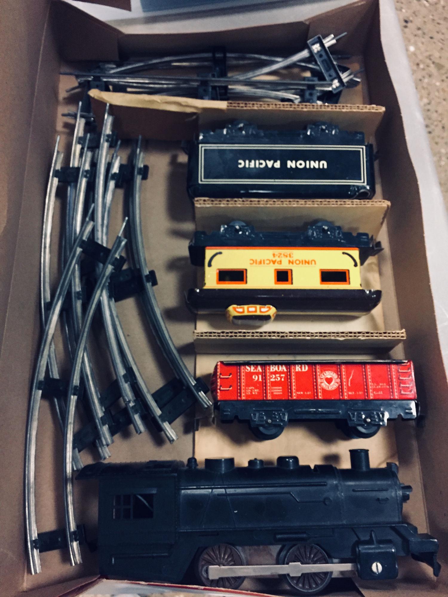 METAL TRAIN SET, ENGINE, 2 CAR CABOOSE, AND TRACKS, AND (1 of 4)