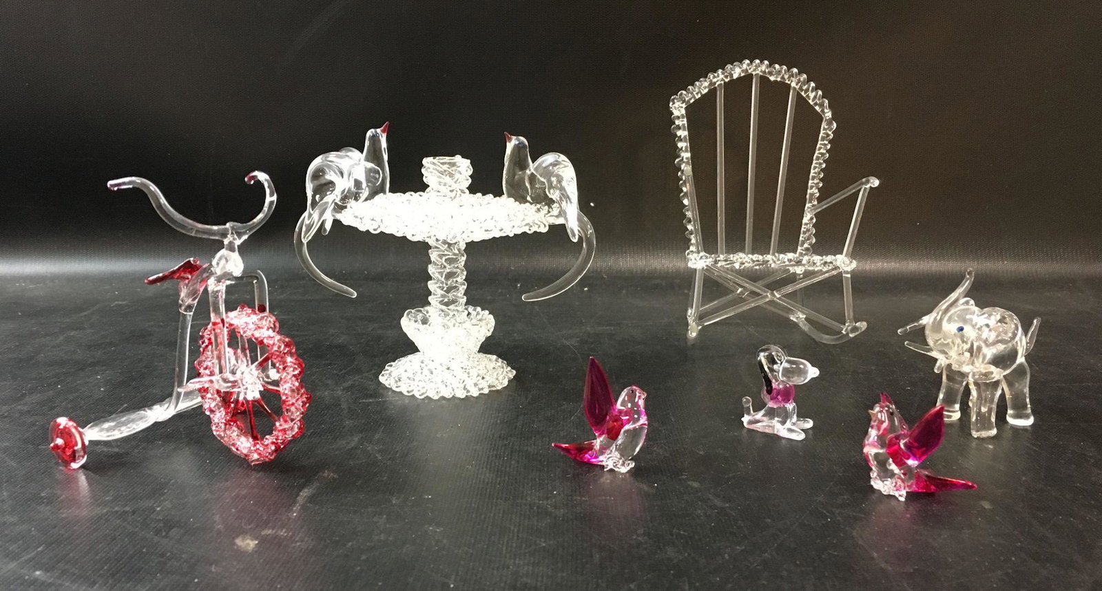 SEVEN FANCY GLASS PIECES INCLUDING BIRD BATH AND: SEVEN FANCY GLASS PIECES INCLUDING BIRD BATH AND TRICYCLE**CAN NOT SHIP IN-HOUSE. PICK-UP OR UPS STORE ONLY.