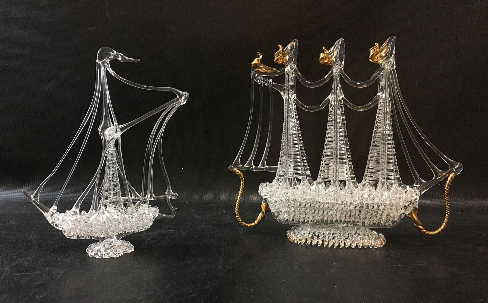 TWO ORNATE GLASS SAILING SHIPS: SEVEN FANCY GLASS PIECES INCLUDING BIRD BATH AND TRICYCLE**CAN NOT SHIP IN-HOUSE. PICK-UP OR UPS STORE ONLY.