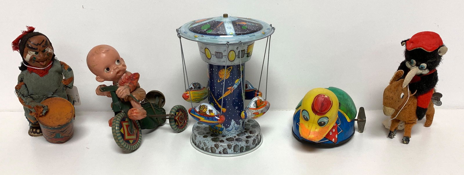 BOX LOT TOYS INCLUDING WIND-UP INDIAN AND WIND-UP BEAR: BOX LOT TOYS INCLUDING WIND-UP INDIAN AND WIND-UP BEAR ON DONKEY