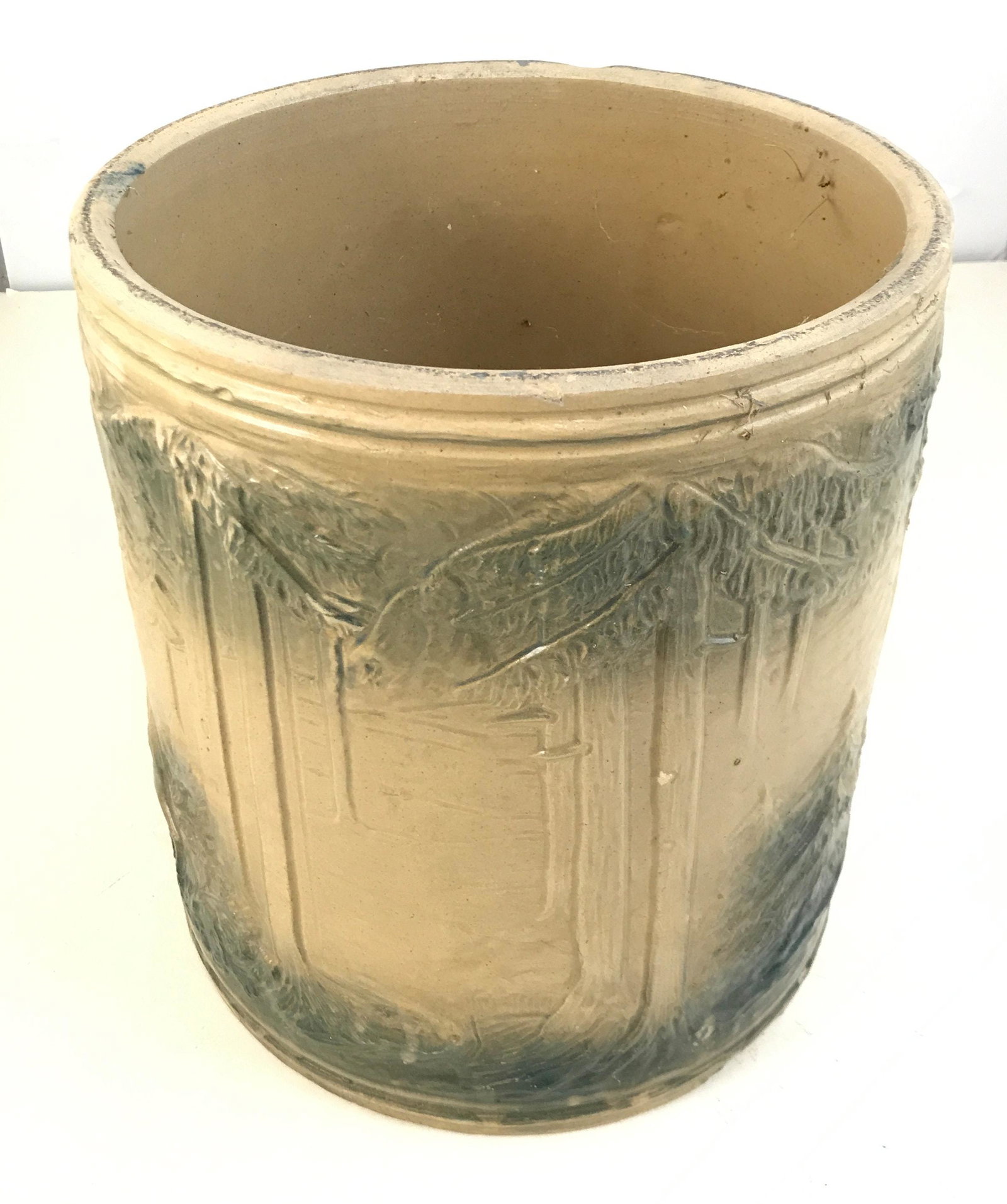 YELLOW WARE BEVERAGE COOLER WITH STAG AND COW MOTIF 12": YELLOW WARE BEVERAGE COOLER WITH STAG AND COW MOTIF 12" TALL. MISSING TOP AND SPOUT AND HAS A SMALL RIM CHIP