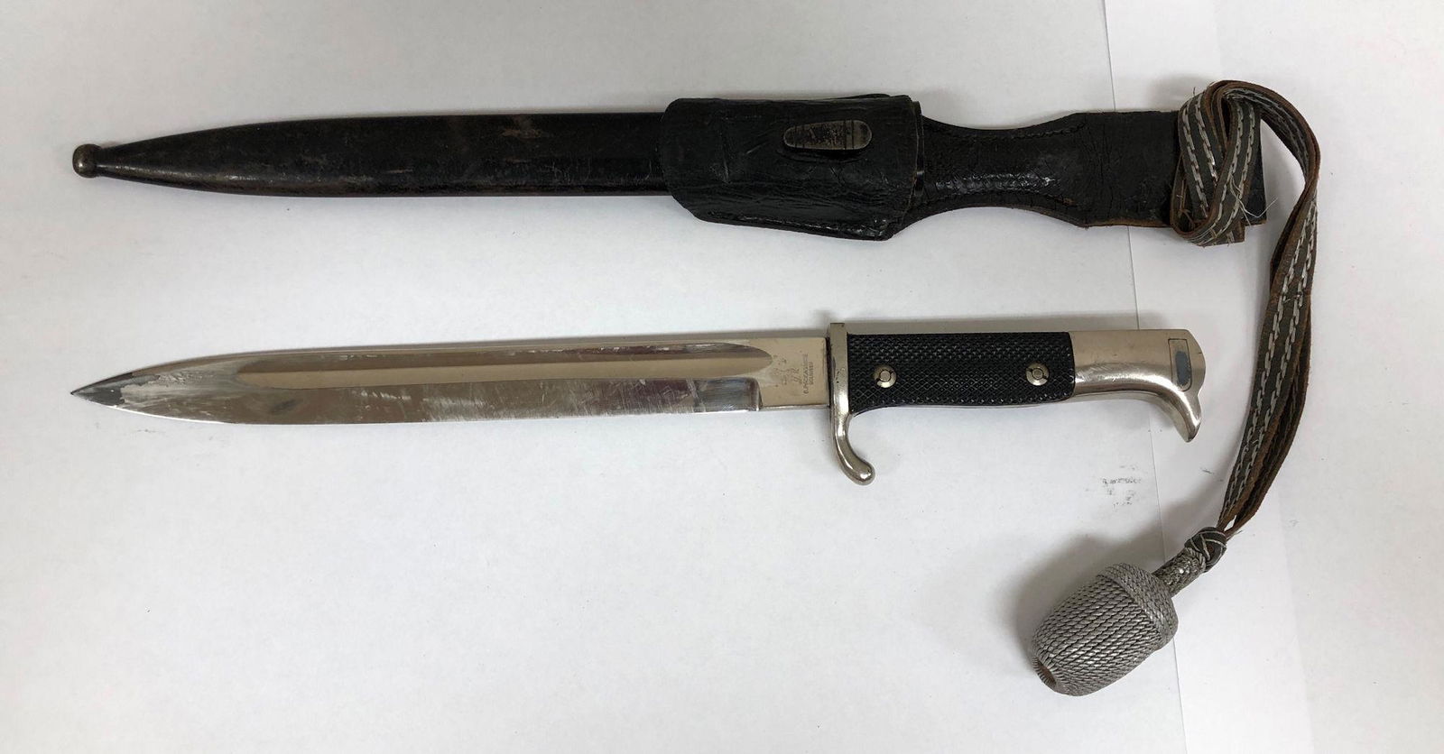 GERMAN BAYONET, MARKED E. PACK & SOHN ON BLADE. LEATHER (1 of 2)