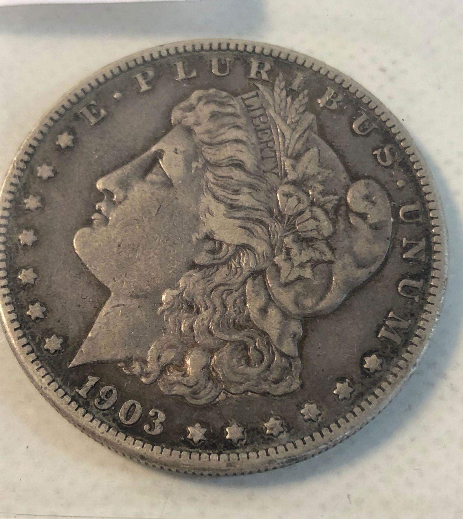 MORGAN SILVER DOLLAR (1 of 2)