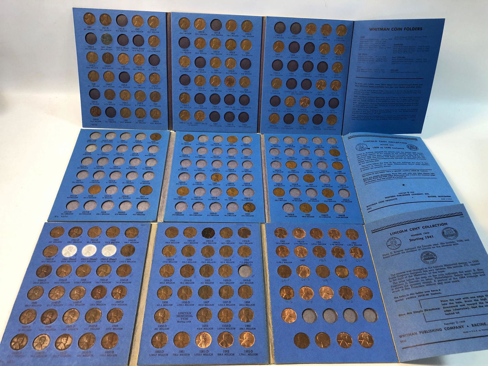 LINCOLN PENNY COIN ALBUMS WITH CONTENTS: LINCOLN PENNY COIN ALBUMS WITH CONTENTS ~ WHEAT EAR AND MEMORIAL VARIETIES. ALBUMS DATED 1909 - 1940, 1941 - , AND 1941 - 1974. THE LATER DATE ALBUMS ARE ALMOST COMPLETE, AND HALF COMPLETE RESPECTIVEL