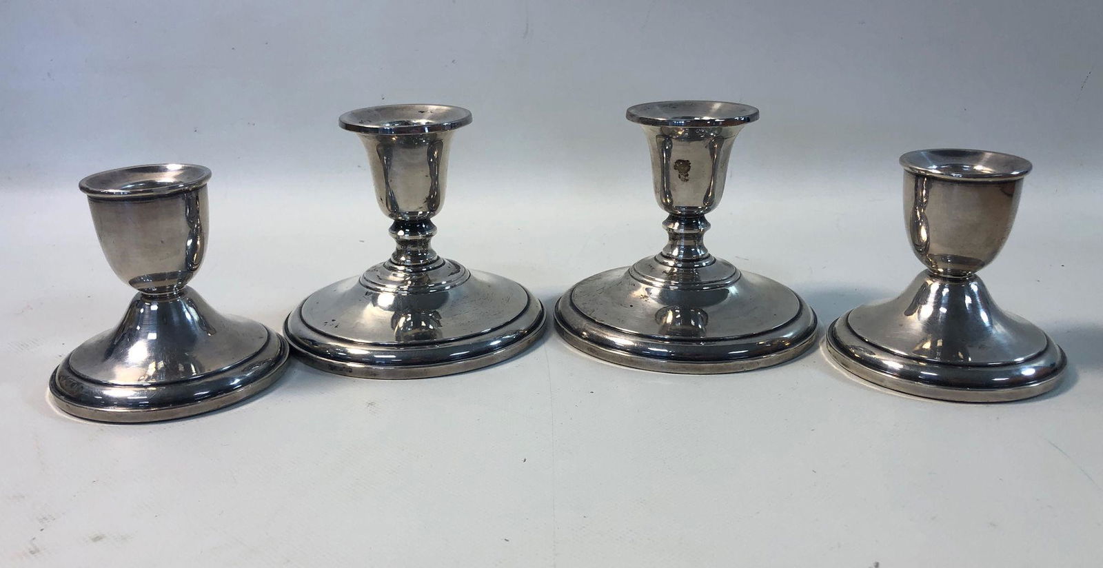 LOT OF STERLING WEIGHTED CANDLESTICK BASES (1 of 6)