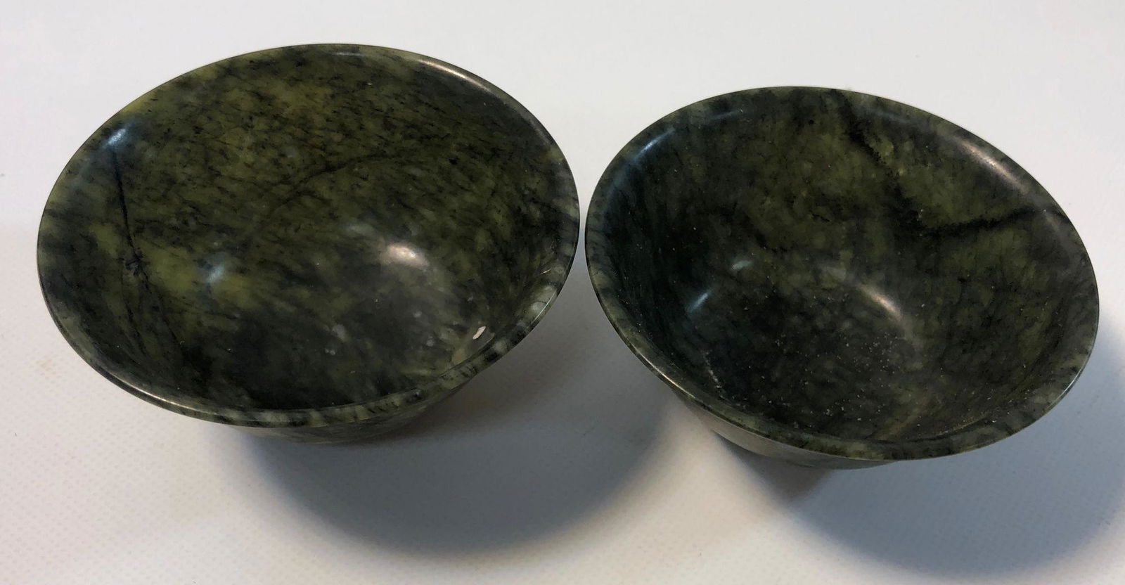 TWO SMALL GREEN JADE DRINKING SAUCERS (1 of 3)