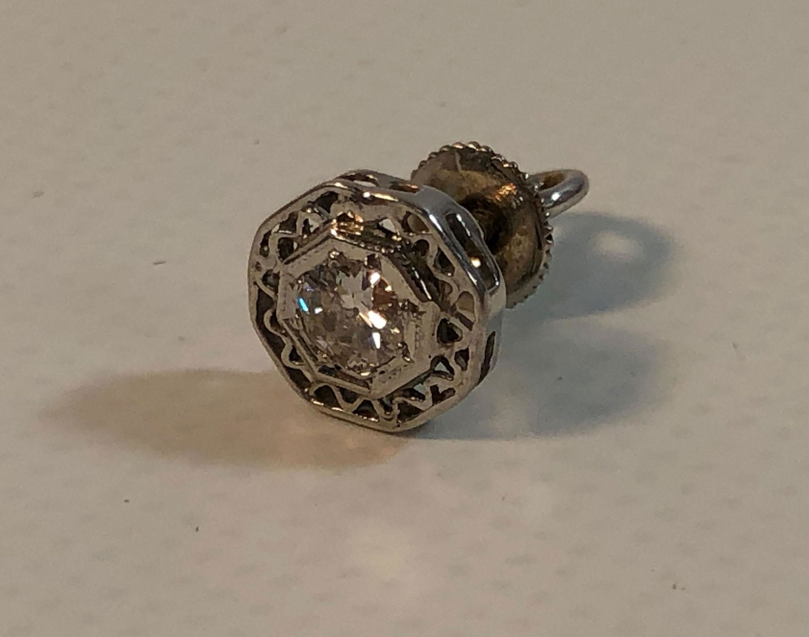 ONE DIAMOND EARRING (1 of 5)