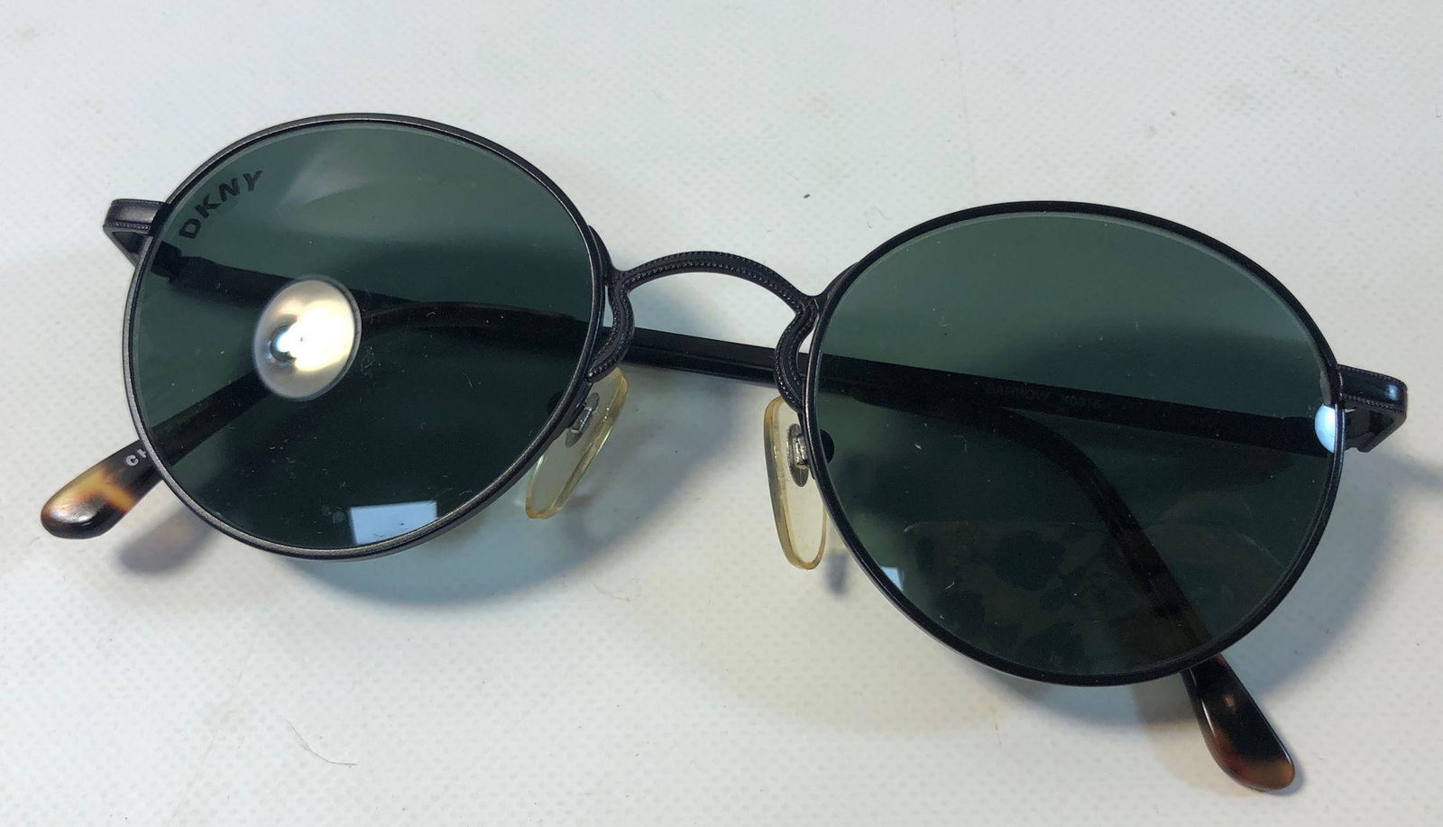DESIGNER SUNGLASSES: DESIGNER SUNGLASSES ~ DKNY SUNGLASSES. ROUND FRAMES. BRANDED AND MARKED. "BARROW". NUMBERED K0316. LIKE NEW.