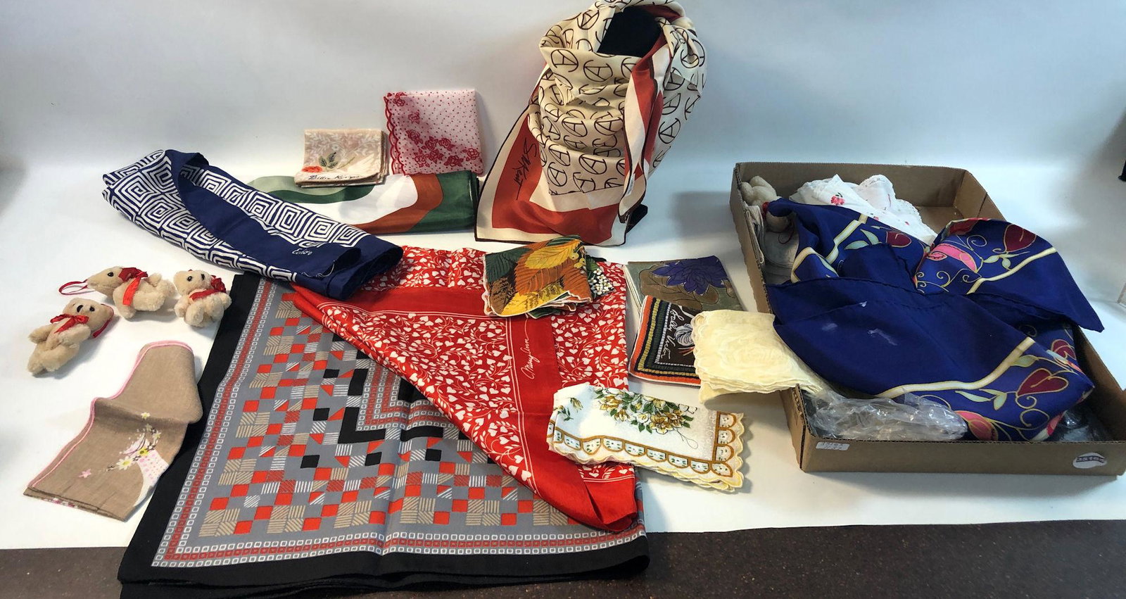 VINTAGE SCARVES HANDKERCHEIFS AND ACCESSORIES: VINTAGE SCARVES HANDKERCHEIFS AND ACCESSORIES ~ LOT INCLUDES DOZENS OF HANDKERCHIEFS AND SCARVES INCLUDING FLORAL, GEOMETRIC AND ABSTRACT DESIGNS, OVER TEN HANDKERCHIEFS AND FIVE SCARVES, LOT ALSO INC