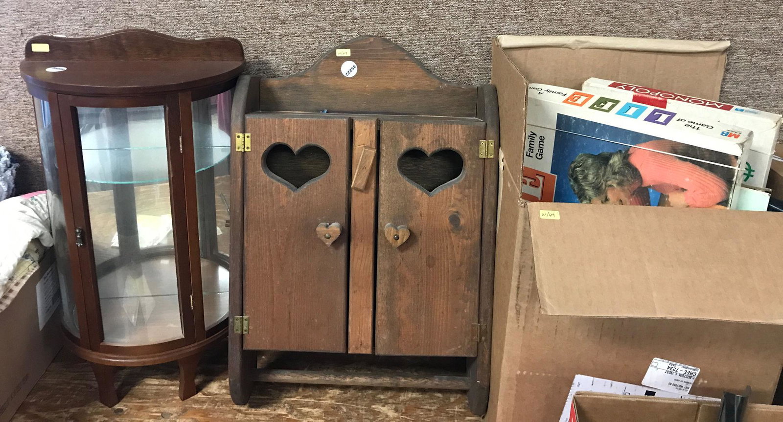 HALF ROUND DISPLAY CASE, HANGING SHELF, AND BOX OF: HALF ROUND DISPLAY CASE, HANGING SHELF, AND BOX OF GAMES
