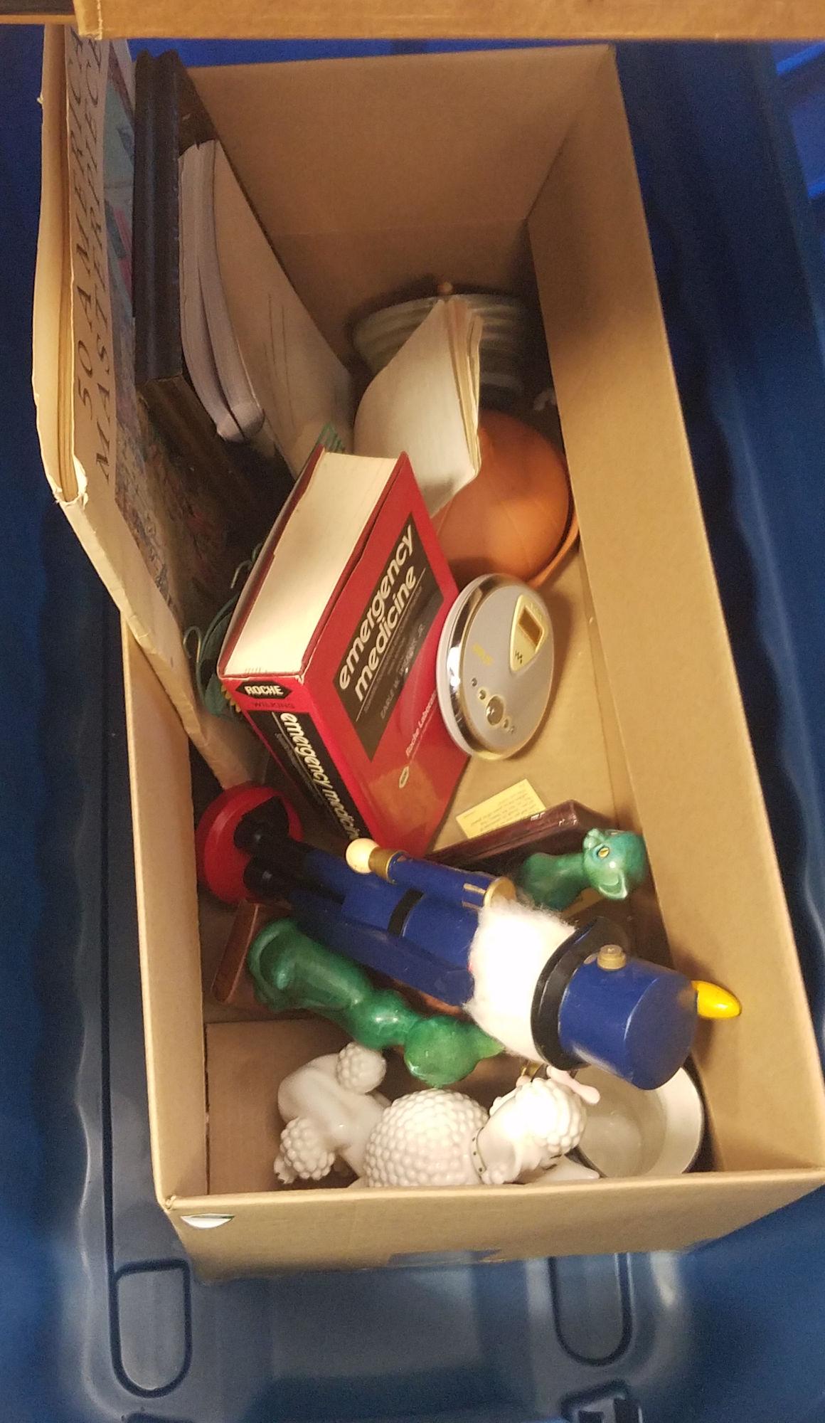 BOX LOT TOTE AND LID WITH NUTCRACKER, BOOKS, AND: BOX LOT TOTE AND LID WITH NUTCRACKER, BOOKS, AND FIGURINES