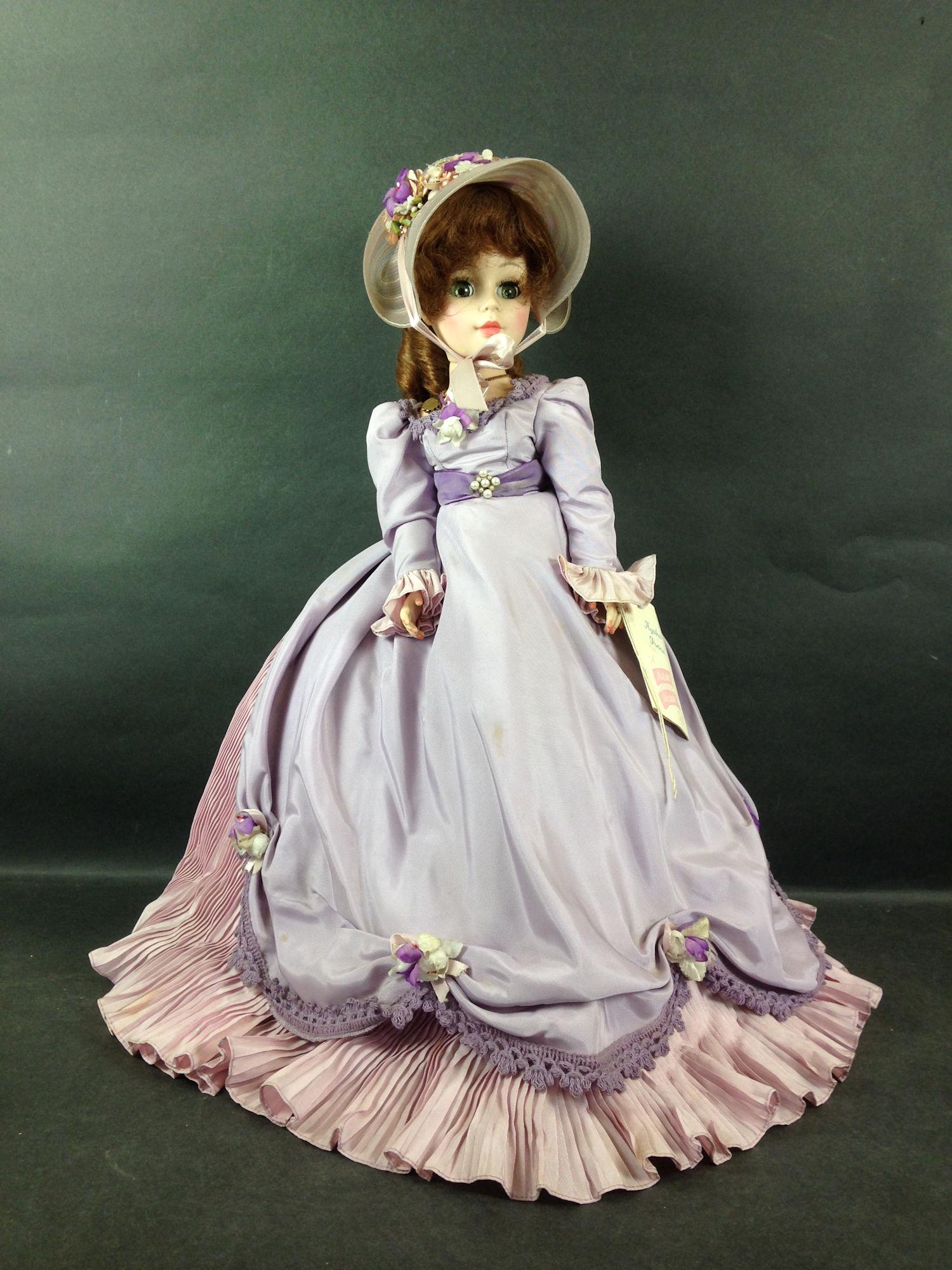 19" MADAME ALEXANDER VINYL PORTRAIT "AGATHA". DRESSED: 19" MADAME ALEXANDER VINYL PORTRAIT "AGATHA". DRESSED IN PURPLE TAFFETA, NO SHOES.