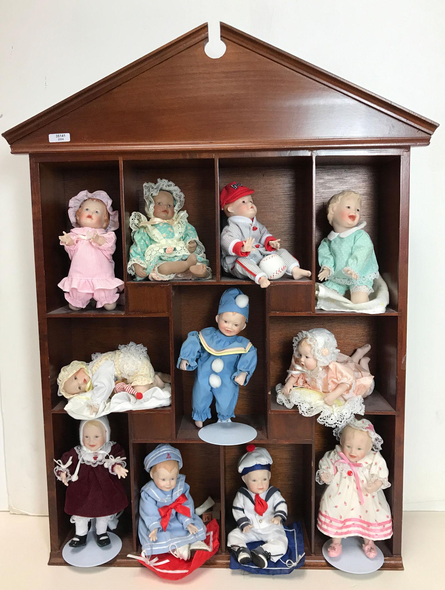 ASHTON-DRAKE DISPLAY CASE WITH (11) YOLANDA BELLO'S (1 of 1)