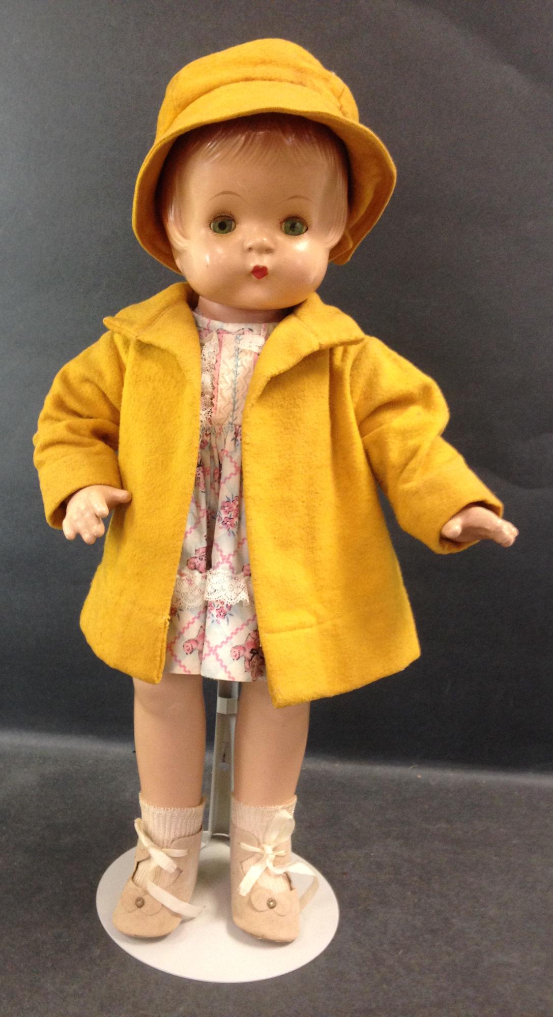 19" EFFANBEE COMPOSITION PATSY-ANN. MOLDED AND PAINTED: 19" EFFANBEE COMPOSITION PATSY-ANN. MOLDED AND PAINTED HAIR, SLEEP EYES, CLOSED MOUTH, ON FIVE PIECE COMPOSITION BODY WITH BENT RIGHT ARM. DOLL WEARS ORIGINAL BLUE AND WHITE PLAYSUIT UNDER DRESS, SLIP