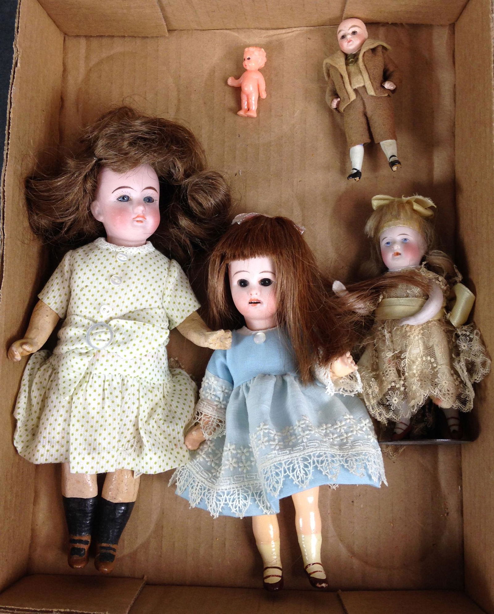 LOT (4) SMALL BISQUE DOLLS INCLUDING ALL BISQUE GIRL (1 of 1)