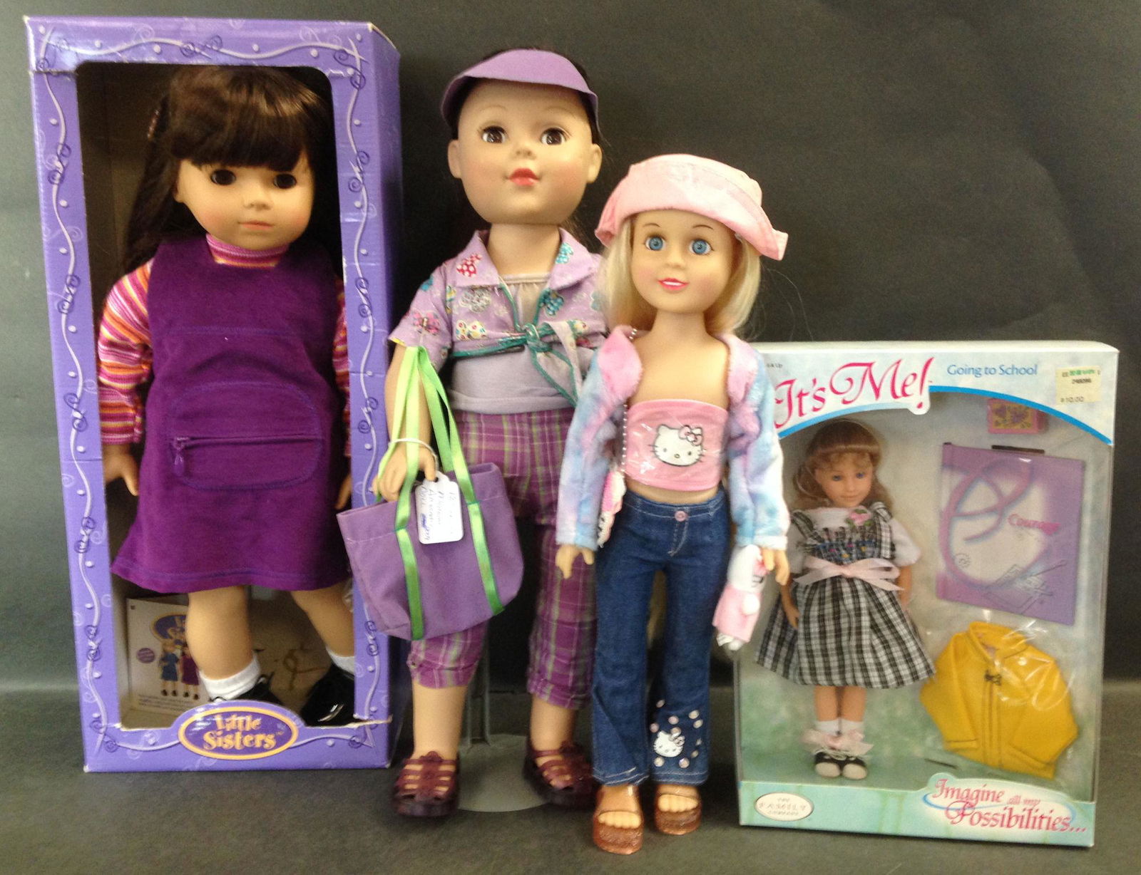 (4) BOXED AND UNBOXED VINYL DOLLS INCLUDING LITTLE (1 of 1)