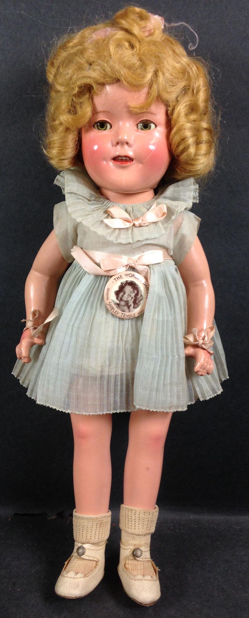 15" IDEAL COMPOSITION SHIRLEY TEMPLE DOLL IN ORIGINAL: 15" IDEAL COMPOSITION SHIRLEY TEMPLE DOLL IN ORIGINAL BOX. MOHAIR WIG IN ORIGINAL SET, SLEEP EYES, OPEN MOUTH WITH TEETH, ON FIVE PIECE COMPOSITION BODY. DOLL IS DRESSED IN TAGGED "CURLY TOP" DRESS, U