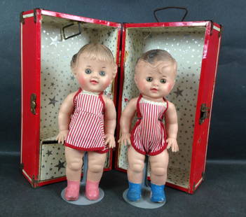 VINTAGE RUBBER TWIN BOY AND GIRL DOLLS BY SUN RUBBER: VINTAGE RUBBER TWIN BOY AND GIRL DOLLS BY SUN RUBBER COMPANY IN VINTAGE RED DOLL CASE.