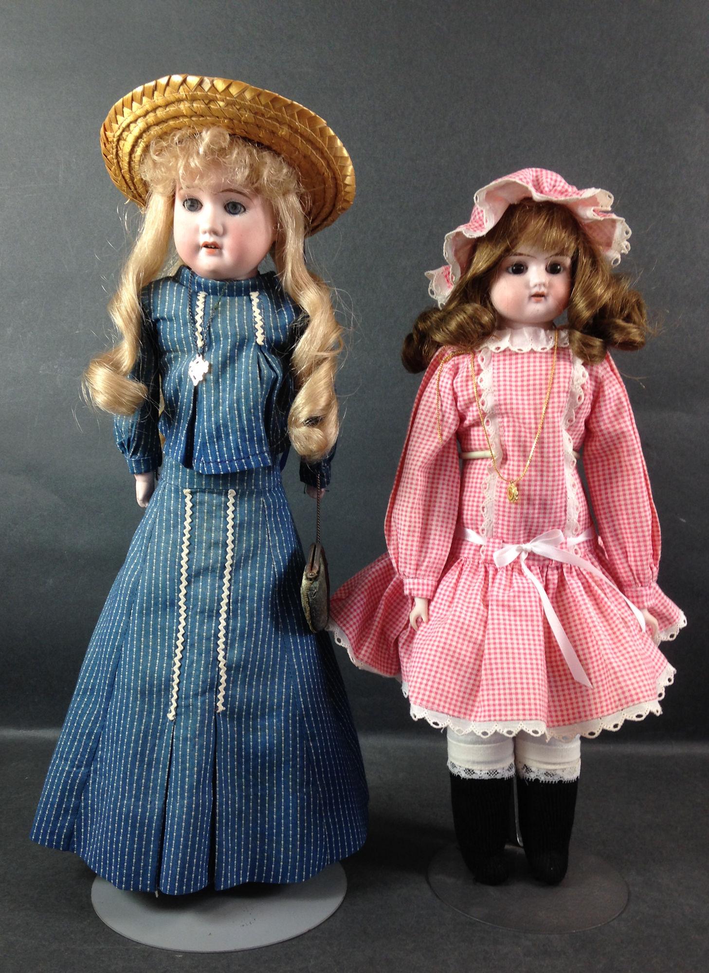 (2) GERMAN BISQUE SHOULDER HEAD DOLLS INCLUDING 16": (2) GERMAN BISQUE SHOULDER HEAD DOLLS INCLUDING 16" MARKED "RUTH" WITH REPLACED WIG, GLASS SET EYES AND OPEN MOUTH ON CLOTH BODY WITH BISQUE LOWER ARMS WEARING RED & WHITE CHECK AND 17" A.M. 3700 TURN