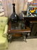 GLASS INSERT PARLOR TABLE AND BLACK DECORATIVE VASE