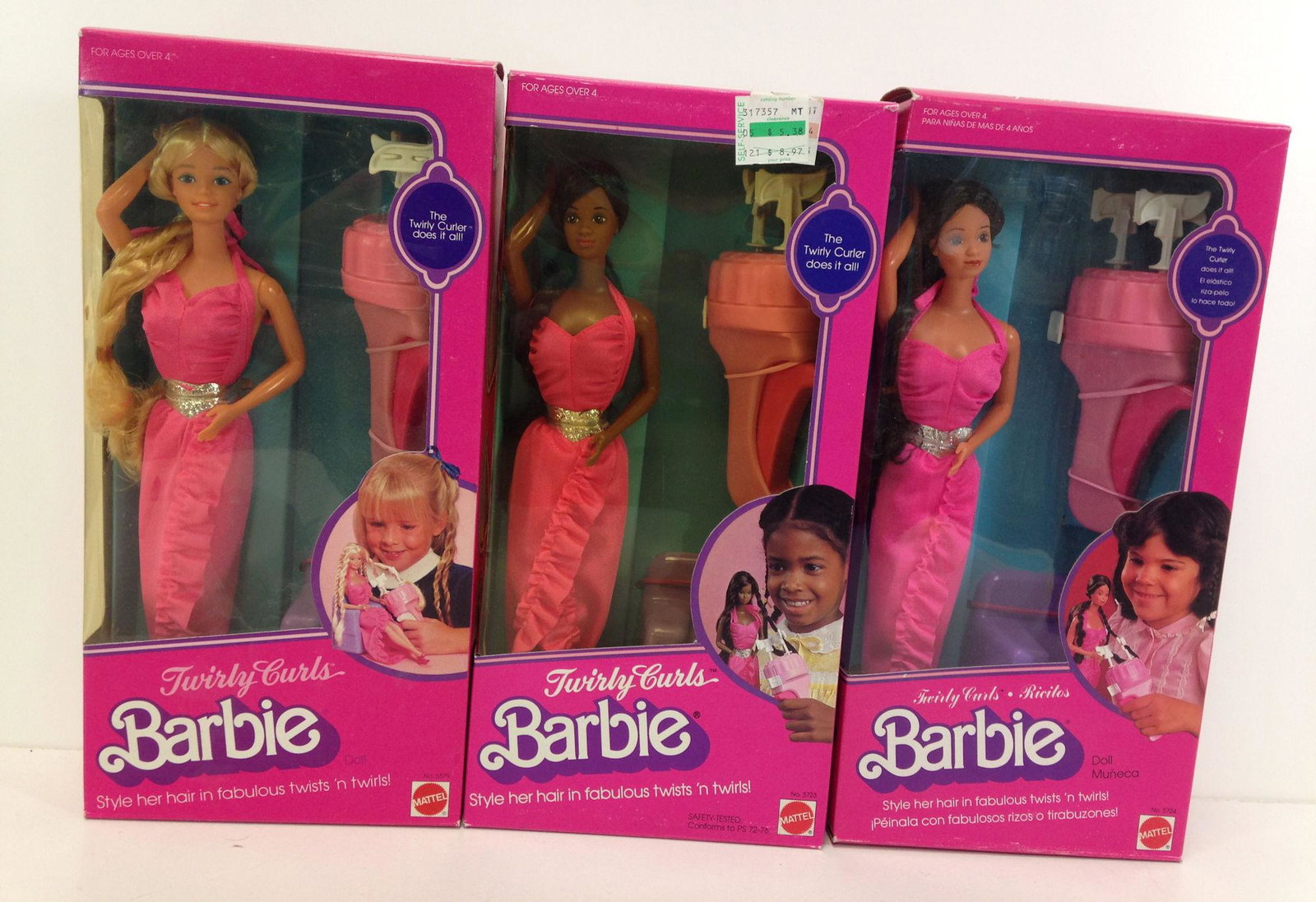 (3) NRFB VINTAGE "TWIRLY CURLS" BARBIES INCLUDING: (3) NRFB VINTAGE "TWIRLY CURLS" BARBIES INCLUDING AFRICAN AMERICAN AND HISPANIC.