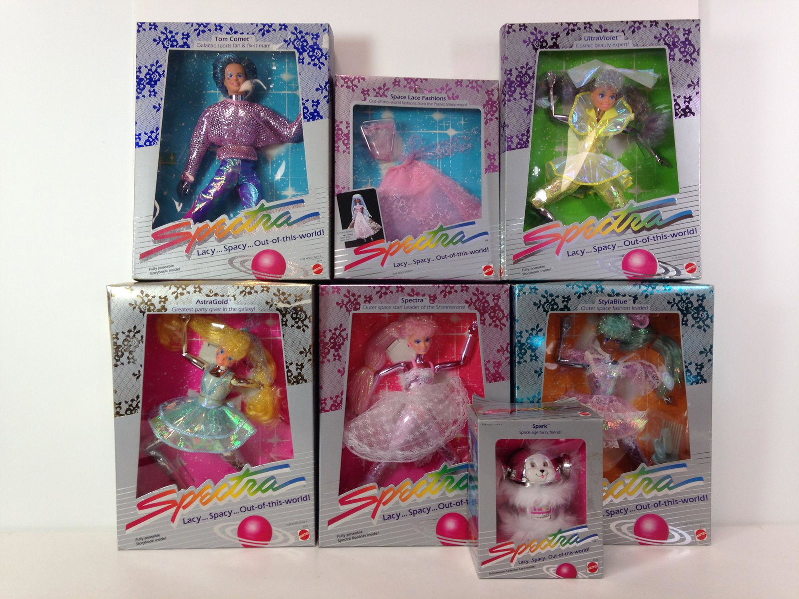 (5) NRFB SPECTRA SHIMMERONS DOLLS INCLUDING "SPECTRA",: (5) NRFB SPECTRA SHIMMERONS DOLLS INCLUDING "SPECTRA", "STYLABLUE", "ASTRAGOLD", "ULTRAVIOLET" AND "TOM COMET". ALSO INCLUDES NRFB "SPARK" AND SPACE LACE FASHION "EVENING GOWN".