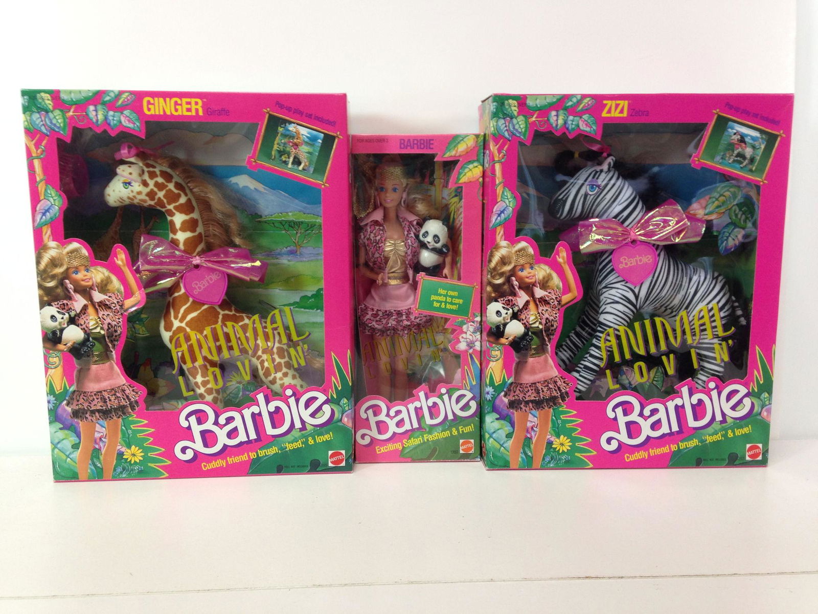 (3) NRFB VINTAGE "ANIMAL LOVIN'" ITEMS INCLUDING BARBIE: (3) NRFB VINTAGE "ANIMAL LOVIN'" ITEMS INCLUDING BARBIE WITH PANDA, "GINGER" GIRAFFE AND "ZIZI" ZEBRA.