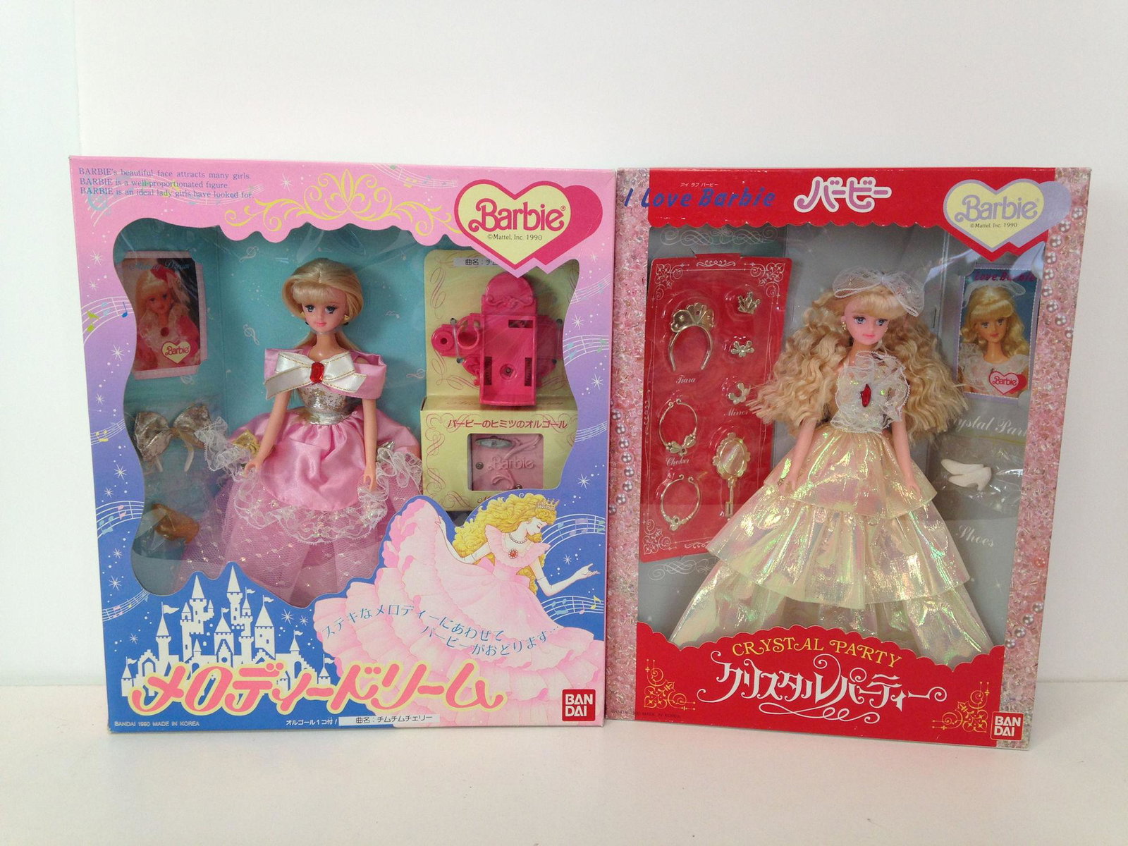 (2) NRFB 1990 BANDAI JAPAN BARBIES INCLUDING "CRYSTAL: (2) NRFB 1990 BANDAI JAPAN BARBIES INCLUDING "CRYSTAL PARTY" AND "MELODY DREAM" BARBIE WITH MUSICAL BASE.