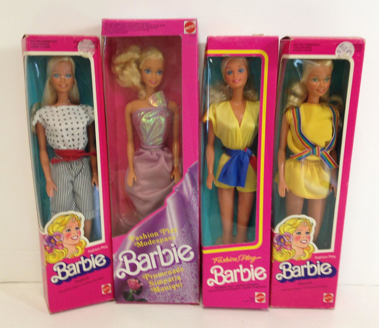 (4) NRFB VINTAGE "FASHION PLAY" BARBIES MADE FOR THE: (4) NRFB VINTAGE "FASHION PLAY" BARBIES MADE FOR THE FOREIGN MARKET.