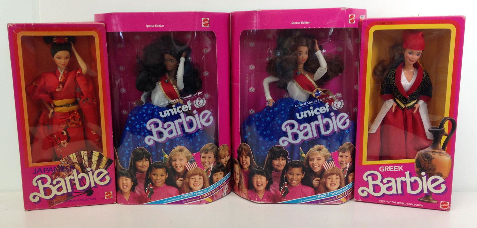 (4) NRFB VINTAGE BARBIES INCLUDING "JAPANESE", "GREEK" (1 of 4)