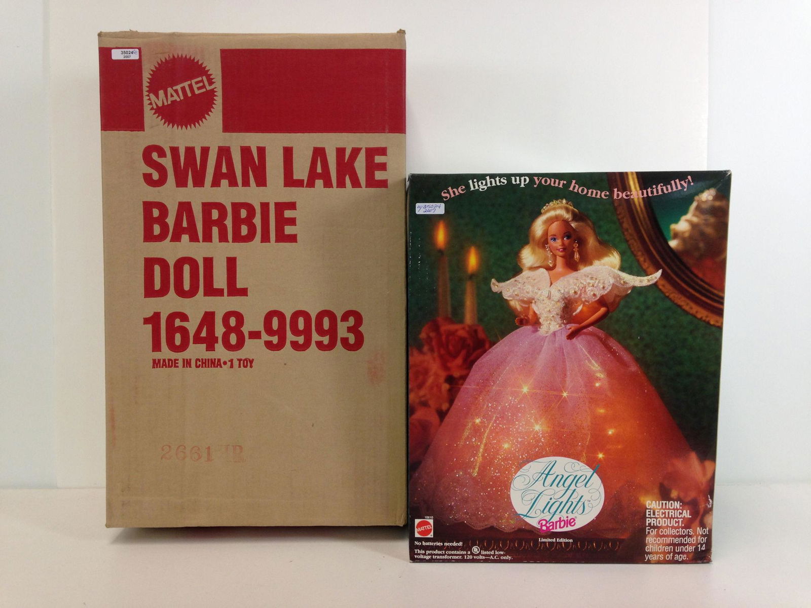 (2) NRFB BARBIES INCLUDING "SWAN LAKE" WITH SHIPPER AND (1 of 2)