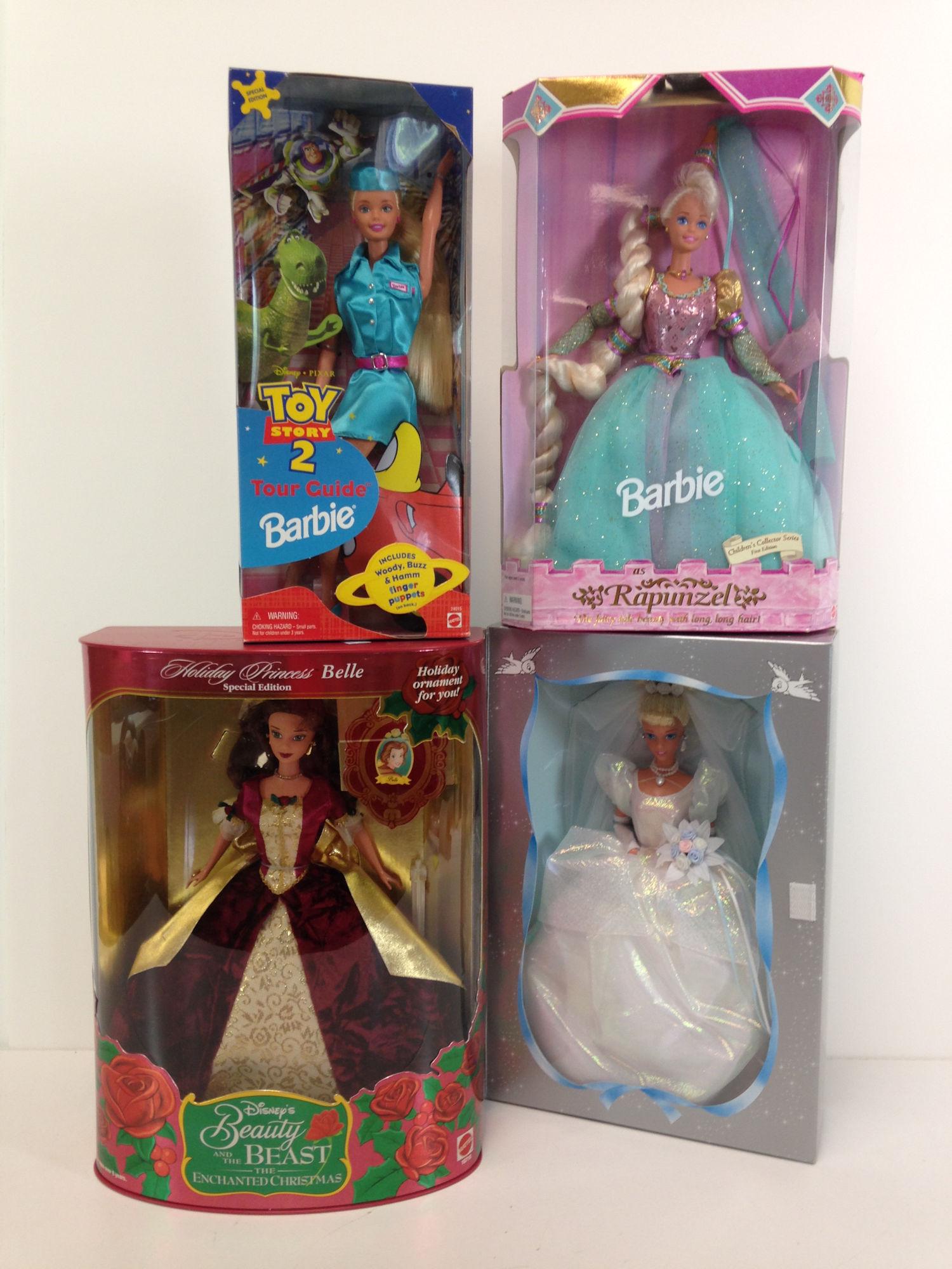 (4) NRFB BARBIE AND FRIENDS INCLUDING TOY STORY 2 "TOUR: (4) NRFB BARBIE AND FRIENDS INCLUDING TOY STORY 2 "TOUR GUIDE", "RAPUNZEL", "WEDDING CINDERELLA" AND "HOLIDAY PRINCESS BELLE".