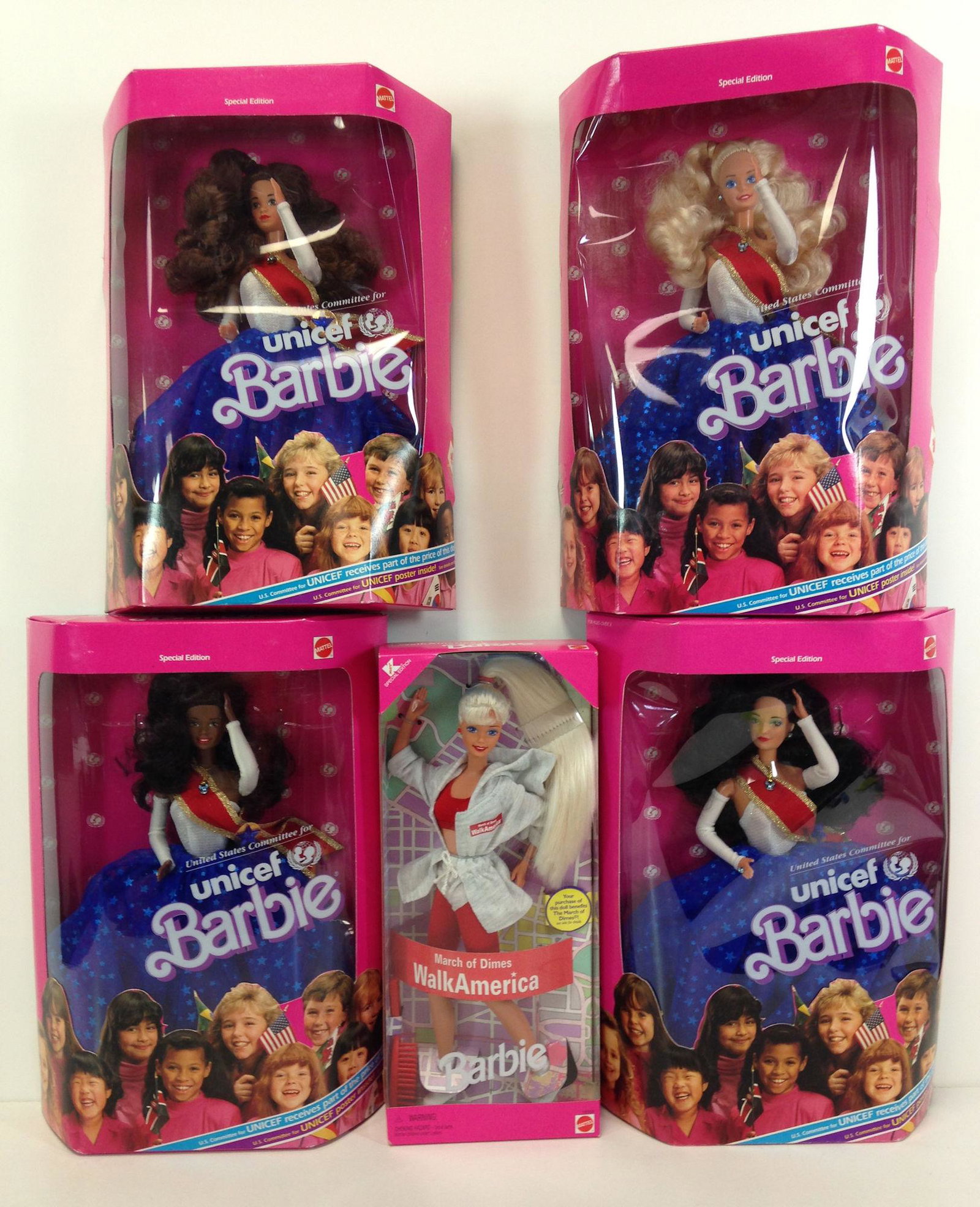 (5) NRFB BARBIES - "WALK AMERICA" AND (4) "UNICEF": (5) NRFB BARBIES - "WALK AMERICA" AND (4) "UNICEF" INCLUDING AFRICAN AMERICAN, HISPANIC, BRUNETTE AND BLONDE BARBIES.