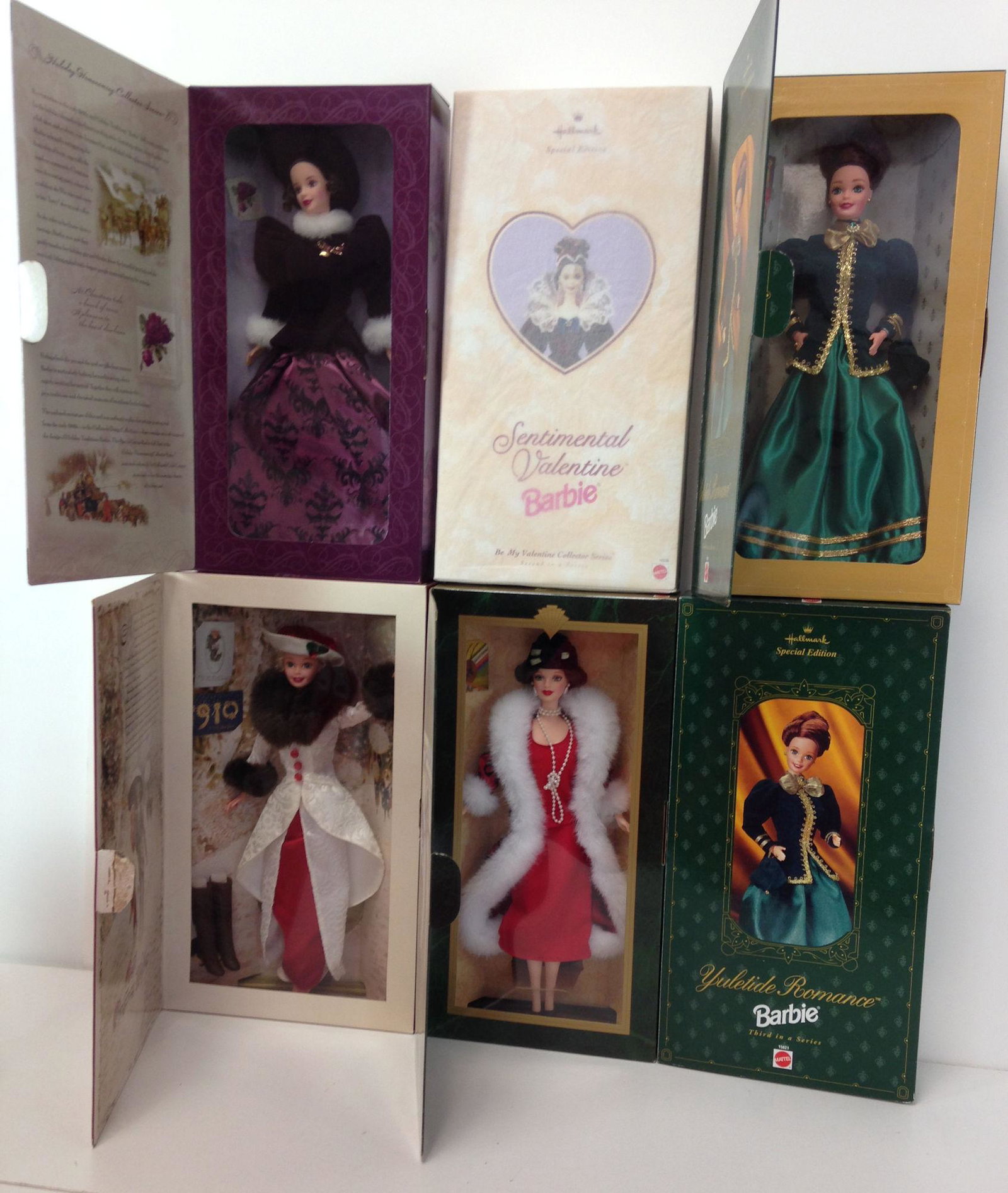 (6) NRFB BARBIES INCLUDING "SENTIMENTAL VALENTINE",: (6) NRFB BARBIES INCLUDING "SENTIMENTAL VALENTINE", "HOLIDAY VOYAGE", (2) YULETIDE ROMANCE", "HOLIDAY TRADITIONS" AND "HOLIDAY MEMORIES".