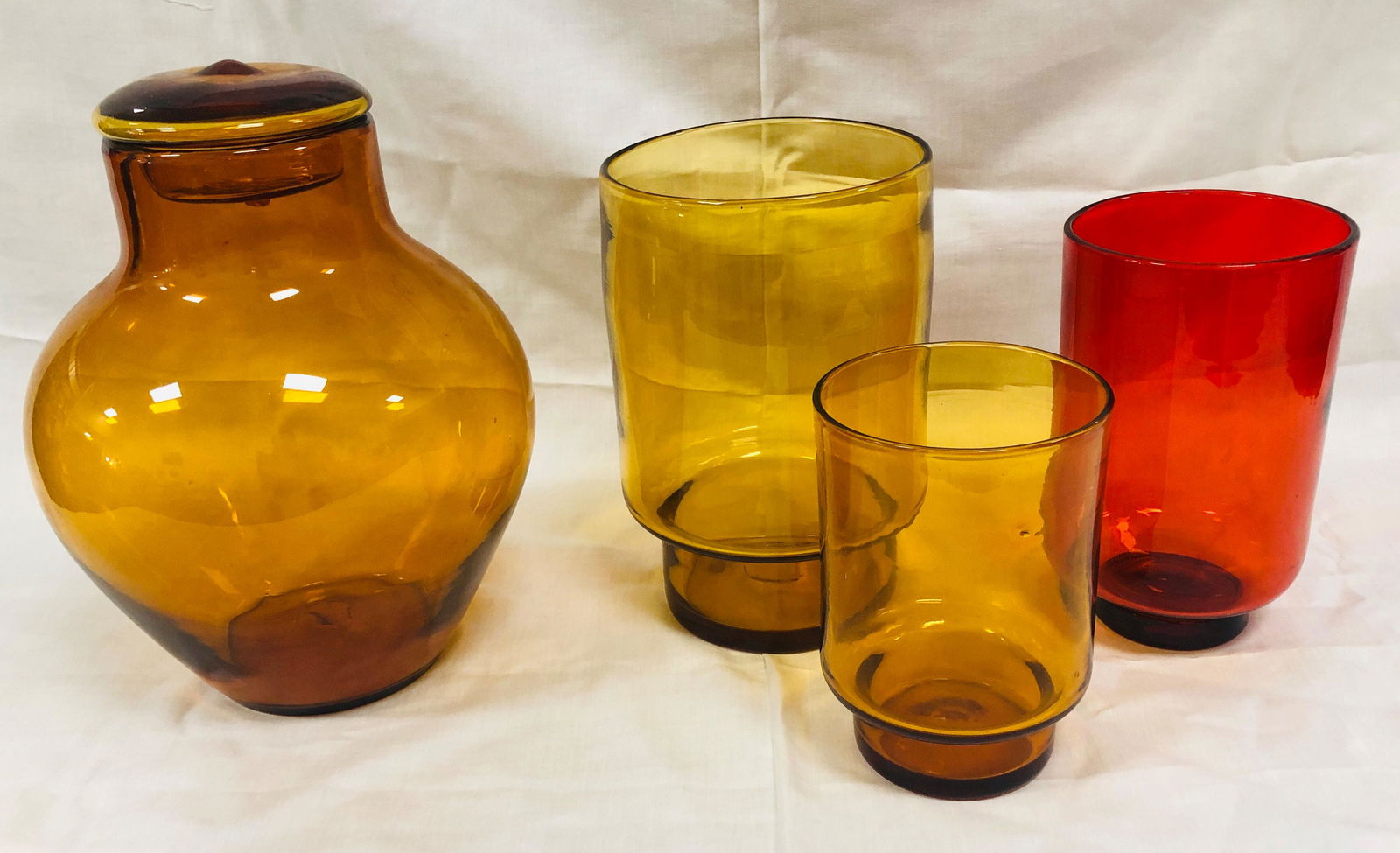 BOX LOT MID-CENTURY GLASS, JAR AND 3 CANDLE HOLDERS, AT: BOX LOT MID-CENTURY GLASS, JAR AND 3 CANDLE HOLDERS, AT LEAST ONE MARKED "BLENKO"