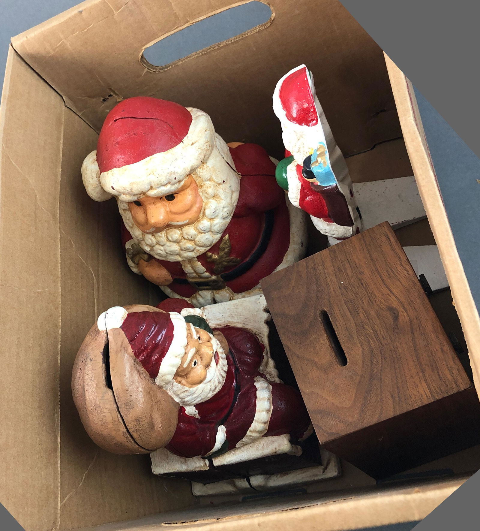 BOX LOT 3 CAST IRON SANTAS AND POST OFFICE BOX BANK: BOX LOT 3 CAST IRON SANTAS AND POST OFFICE BOX BANK