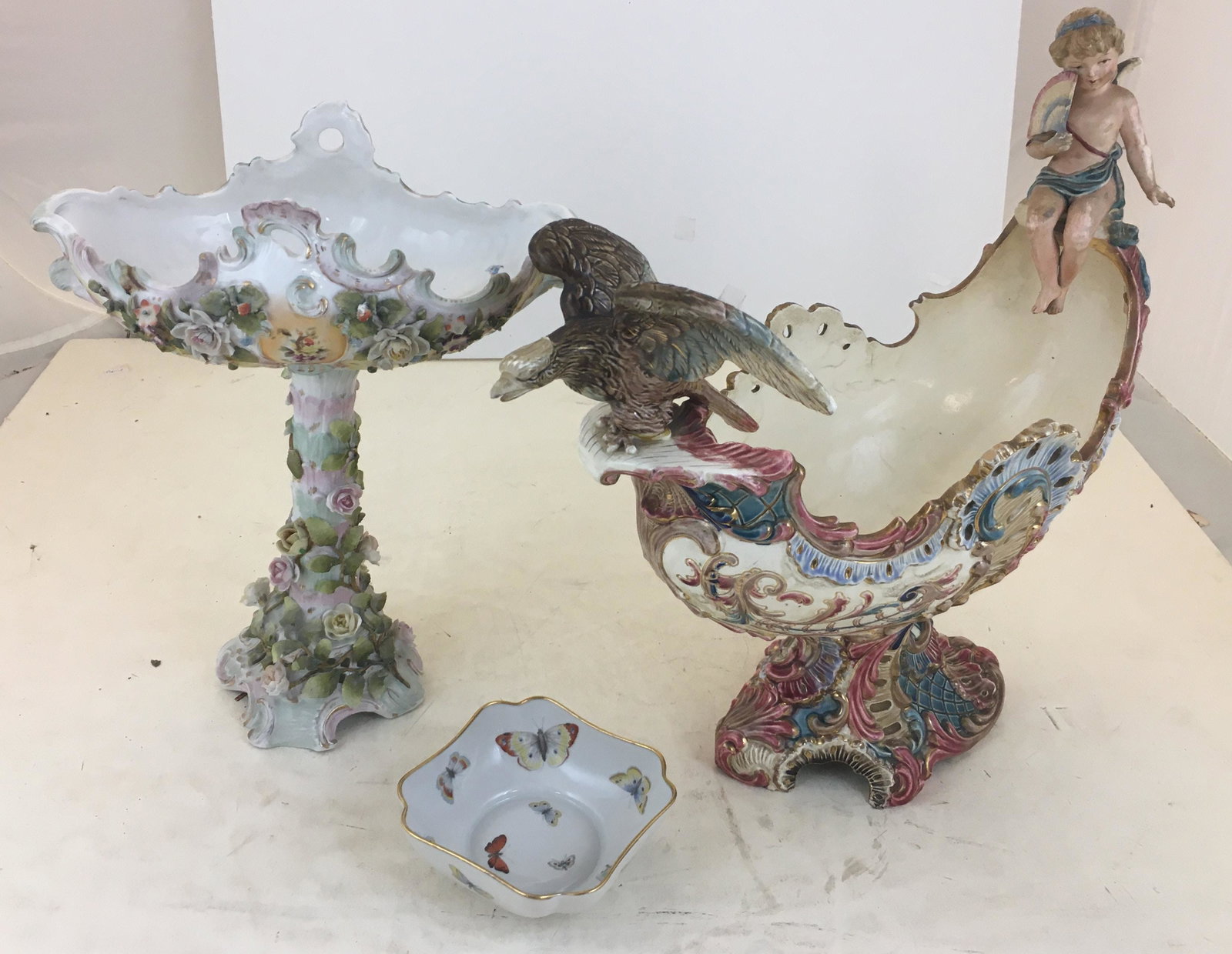 BOX INCLUDING POTTERY AND CHINA ORNATE CENTER PIECES: BOX INCLUDING POTTERY AND CHINA ORNATE CENTER PIECES (SOME DAMAGE)