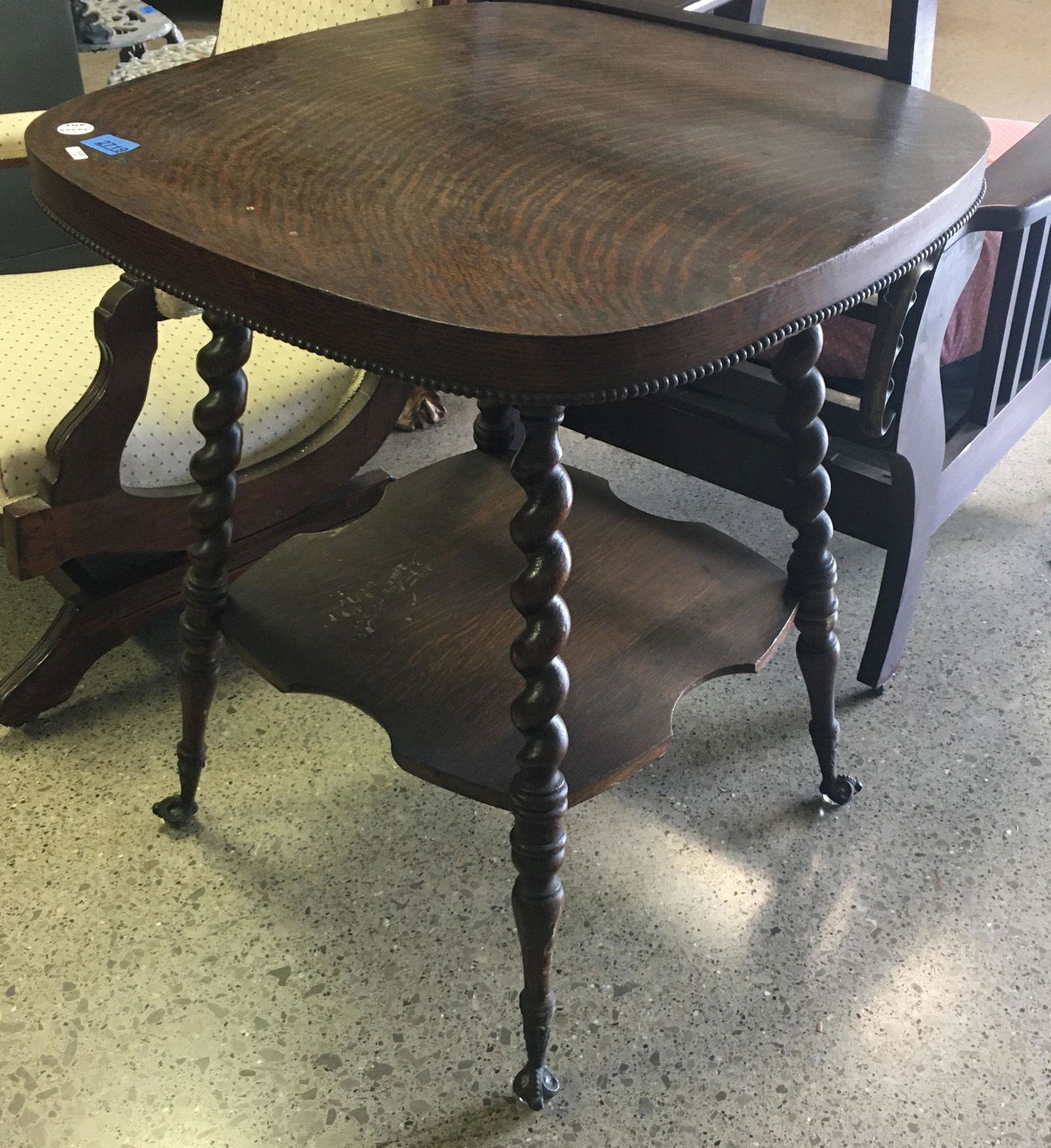 TURN OF THE CENTURY OAK 2 TIER PARLOR TABLE WITH IRON (1 of 2)