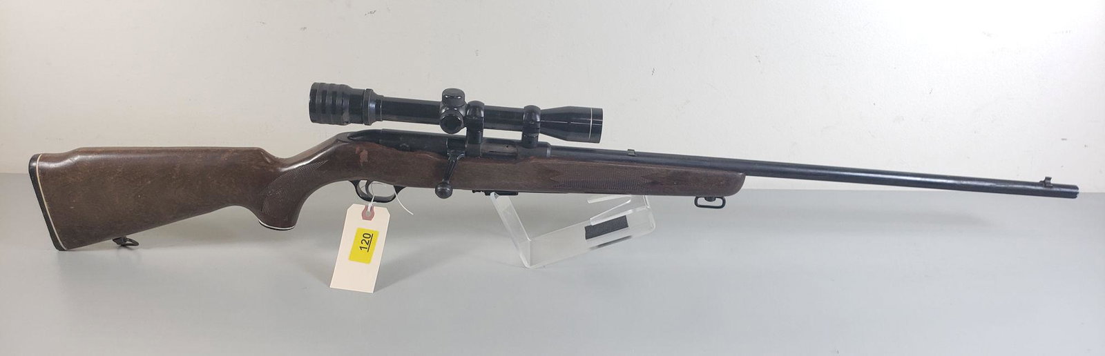 MOSSBERG MODEL CHUCKSTER .22 WINCHESTER MAG CALIBER: MOSSBERG MODEL CHUCKSTER .22 WINCHESTER MAG CALIBER BOLT RIFLE SN: NONE, INCLUDING SCOPEBY BIDDING ON THIS LOT BUYER ACCEPTS RESPONSIBILITY OF KNOWLEDGE OF STATE AND FEDERAL LAWS FOR RECEIVING THIS IT