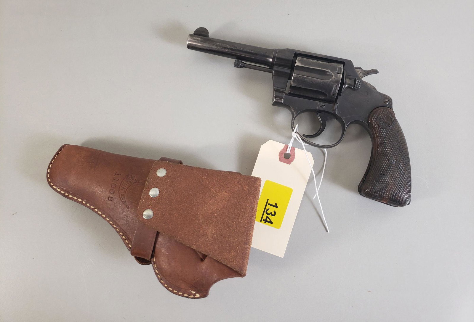 COLT MODEL POLICE POSITIVE SPECIAL .32-20 CALIBER: COLT MODEL POLICE POSITIVE SPECIAL .32-20 CALIBER REVOLVER SN: 233804, INCLUDING HOLSTERBY BIDDING ON THIS LOT BUYER ACCEPTS RESPONSIBILITY OF KNOWLEDGE OF STATE AND FEDERAL LAWS FOR RECEIVING THIS IT