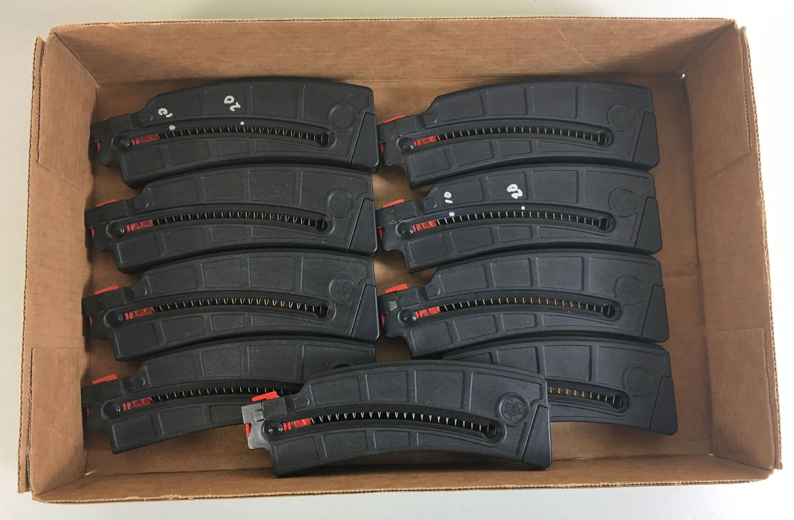 BOX LOT INCLUDING 9 SMITH & WESSON .22 CALIBER RIFLE: BOX LOT INCLUDING 9 SMITH & WESSON .22 CALIBER RIFLE MAGAZINESBY BIDDING ON THIS LOT BUYER ACCEPTS RESPONSIBILITY OF KNOWLEDGE OF STATE AND FEDERAL LAWS FOR RECEIVING THIS ITEM.