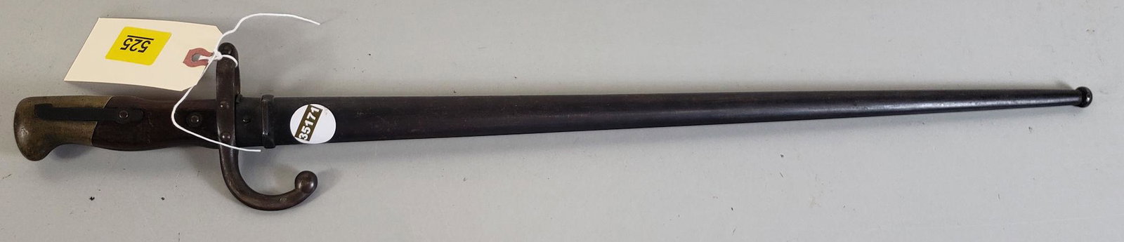 FRENCH MILITARY BAYONET NUMBER ON BAYONET S95967,: FRENCH MILITARY BAYONET NUMBER ON BAYONET S95967, SHEATH NUMBER K65988BY BIDDING ON THIS LOT BUYER ACCEPTS RESPONSIBILITY OF KNOWLEDGE OF STATE AND FEDERAL LAWS FOR RECEIVING THIS ITEM.