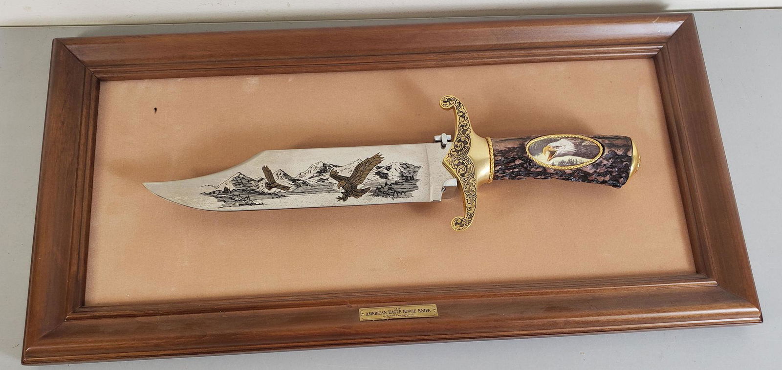 BOWIE KNIFE "AMERICAN EAGLE BOWIE KNIFE" IN DISPLAY: BOWIE KNIFE "AMERICAN EAGLE BOWIE KNIFE" IN DISPLAY CASEBY BIDDING ON THIS LOT BUYER ACCEPTS RESPONSIBILITY OF KNOWLEDGE OF STATE AND FEDERAL LAWS FOR RECEIVING THIS ITEM.