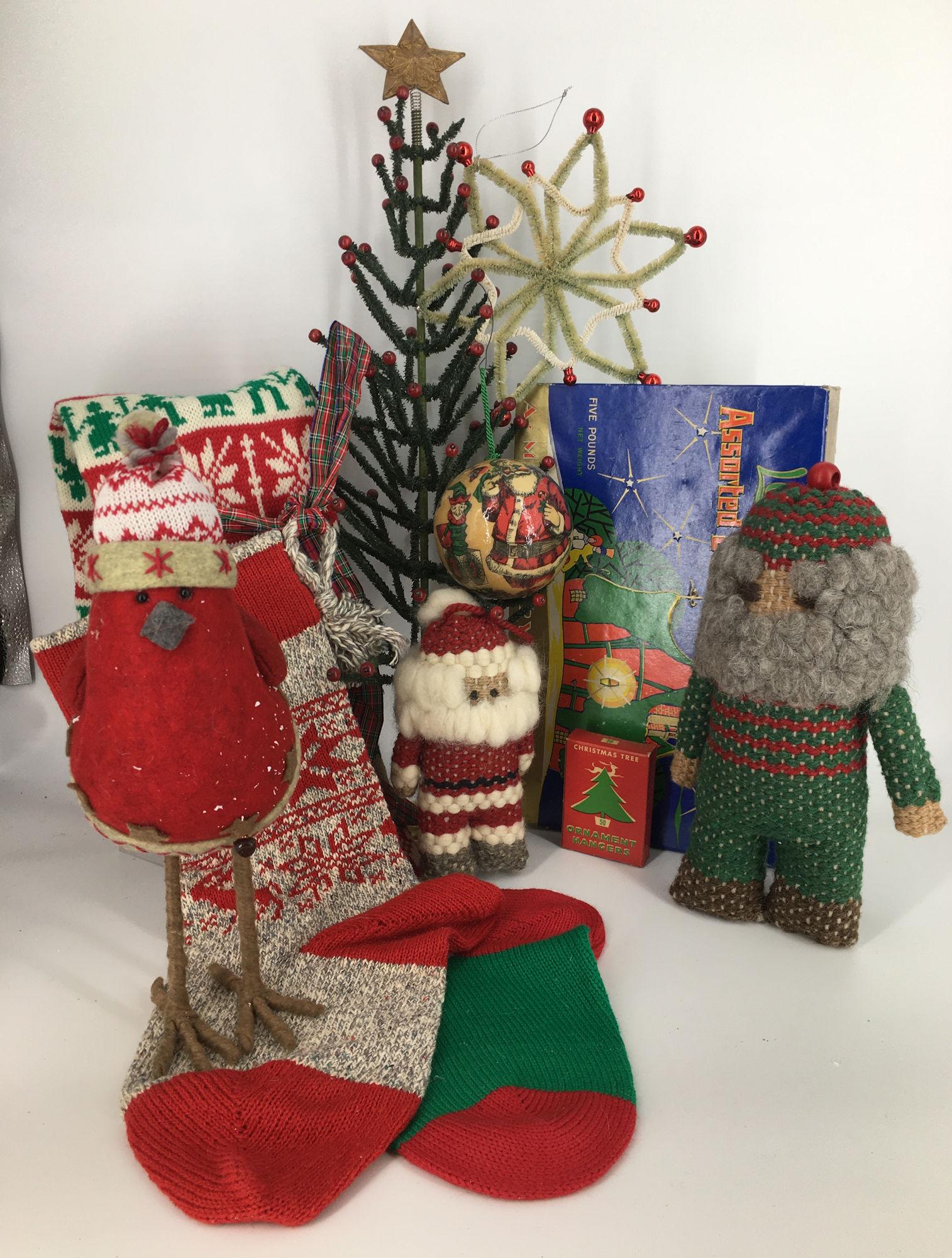 BOX LOT CHRISTMAS INCLUDING SWEATER STOCKINGS AND: BOX LOT CHRISTMAS INCLUDING SWEATER STOCKINGS AND VINTAGE CHRISTMAS TREE MEASURING 24" TALL.
