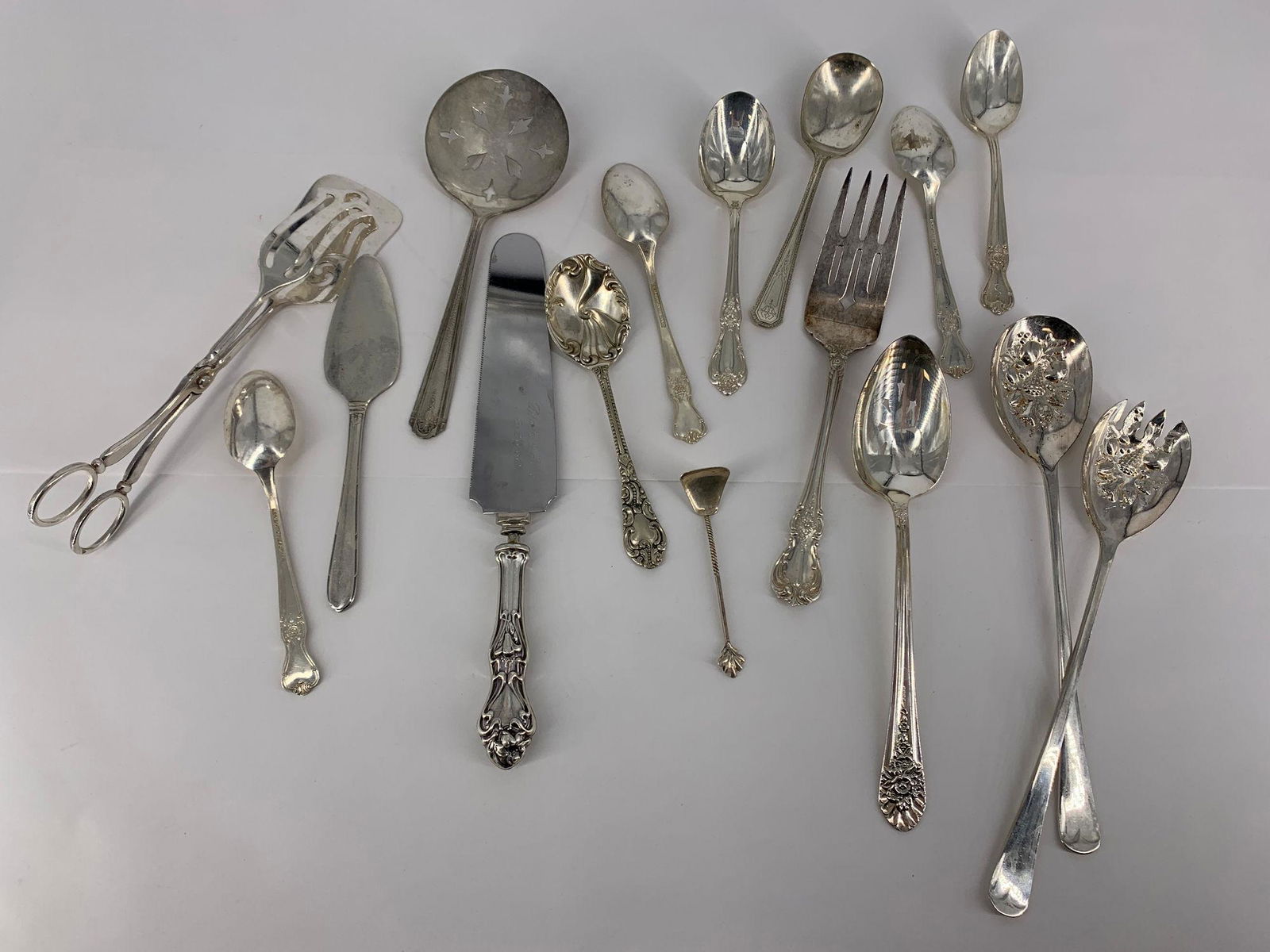 LOT OF ASSORTED VINTAGE SILVER PLATE AND STERLING: LOT OF ASSORTED VINTAGE SILVER PLATE AND STERLING SILVER FLATWARE AND SERVEWARE PIECES ~ SMALL STERLING SILVER BABY SPOON WITH TWISTED HANDLE, AND A LARGE STERLING SILVER SERVING FORK (VINTAGE) FROM T